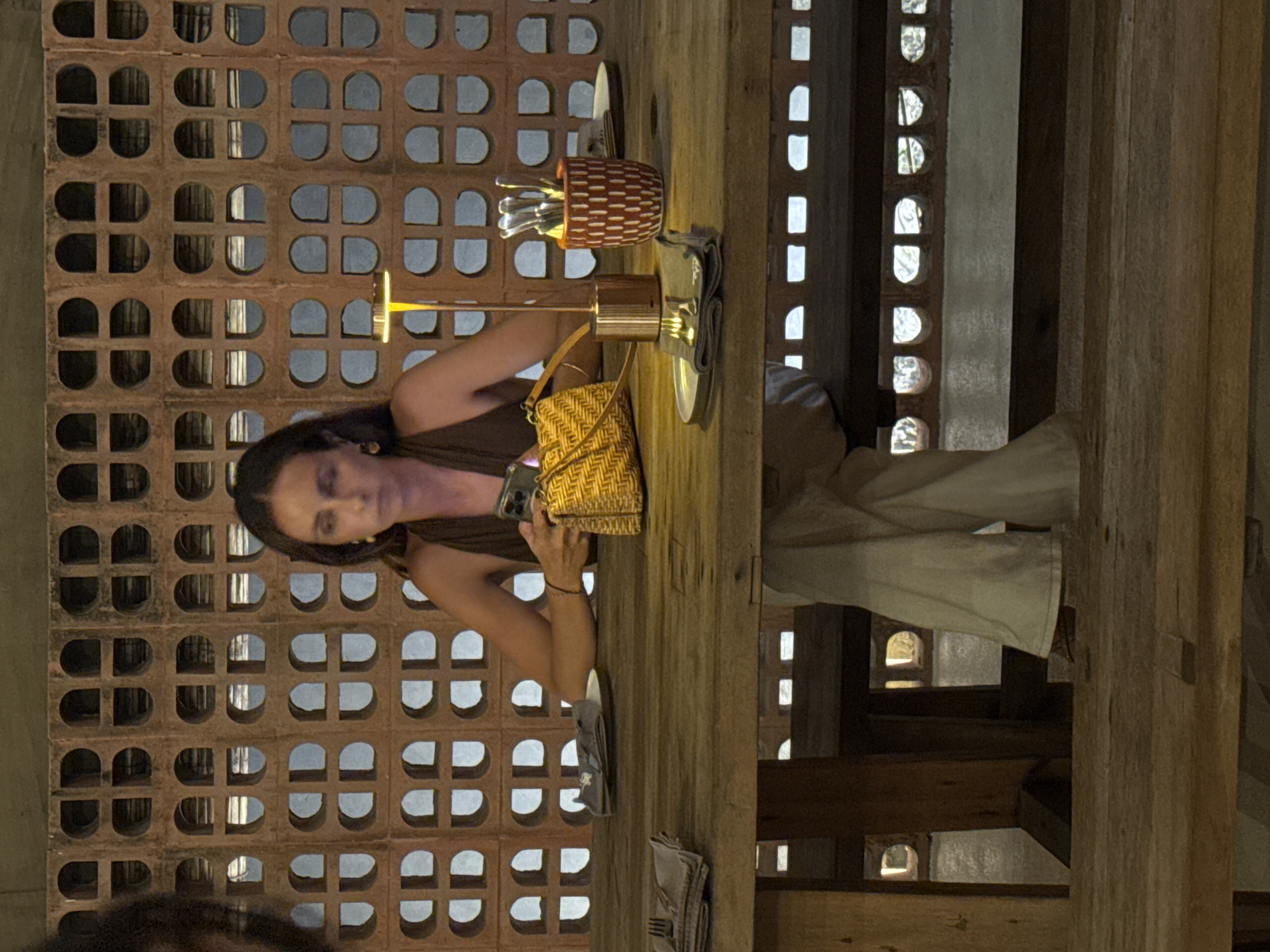 Woman dines at restaurant in Kuta Selatan, Indonesia