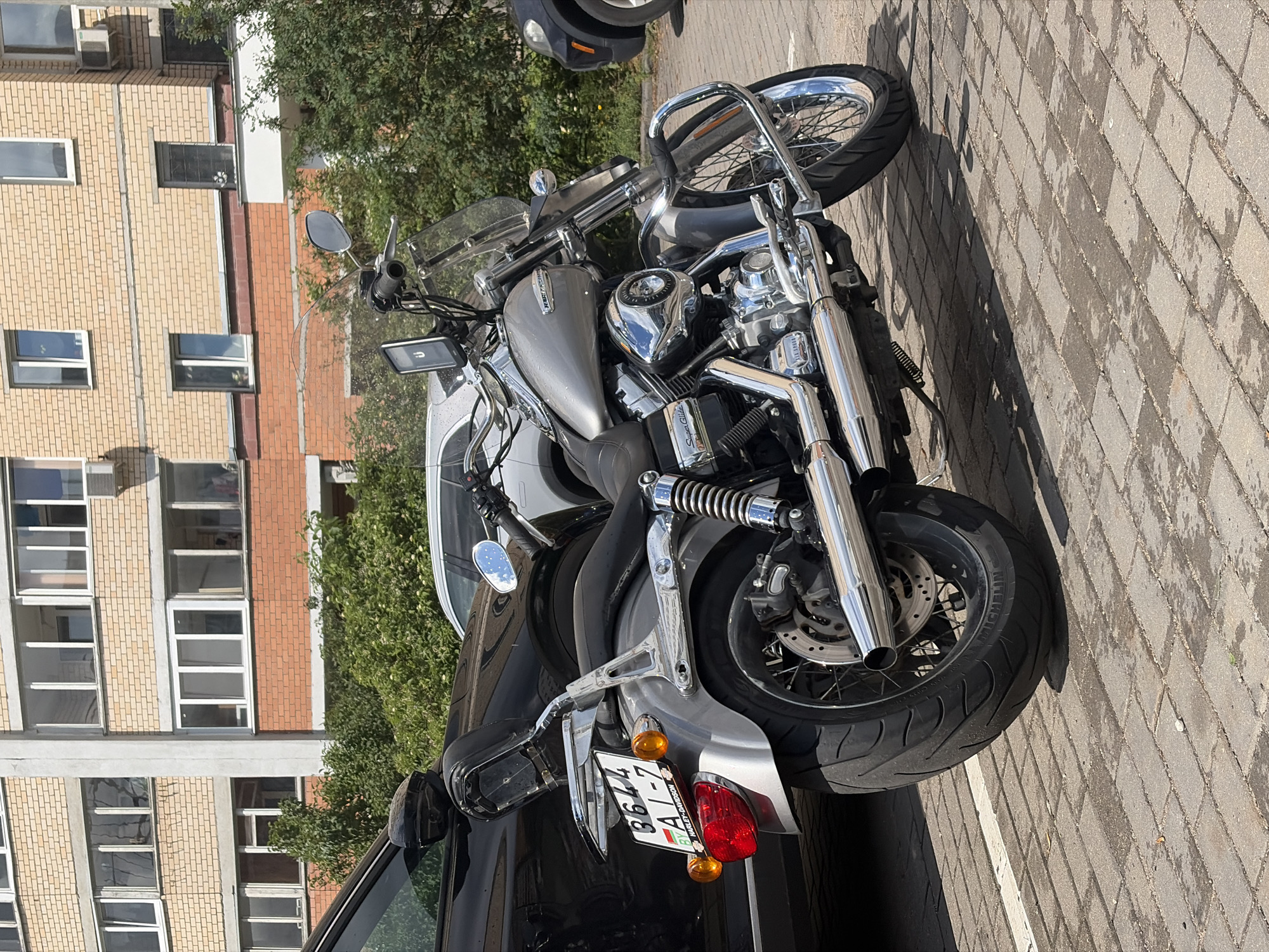 Silver Harley-Davidson Super Glide parked in Minsk