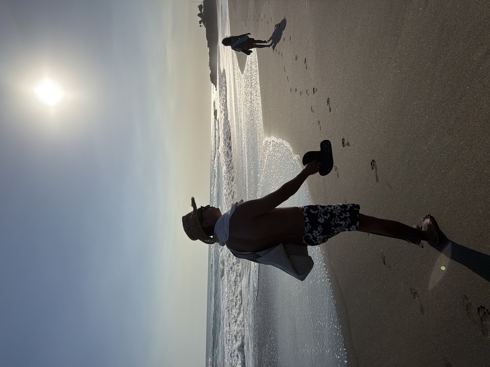 Morning on a black sand beach in Kediri, Bali
