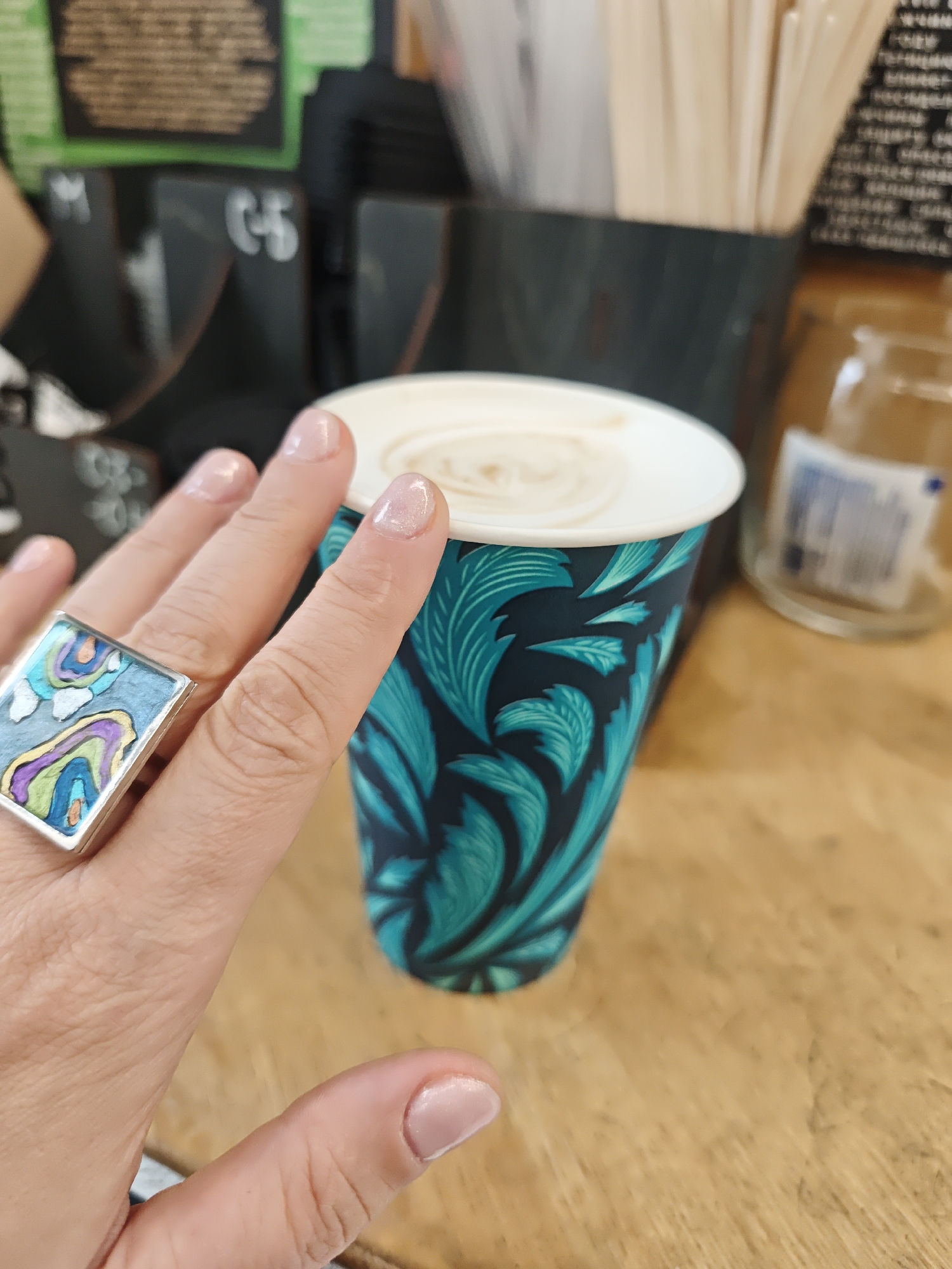 Coffee break at Moscow subway station, distinctive jewelry spotted