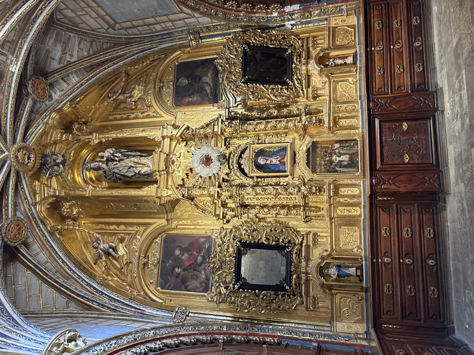 Witness documents Cuenca Cathedral and historic plaza during rainy afternoon