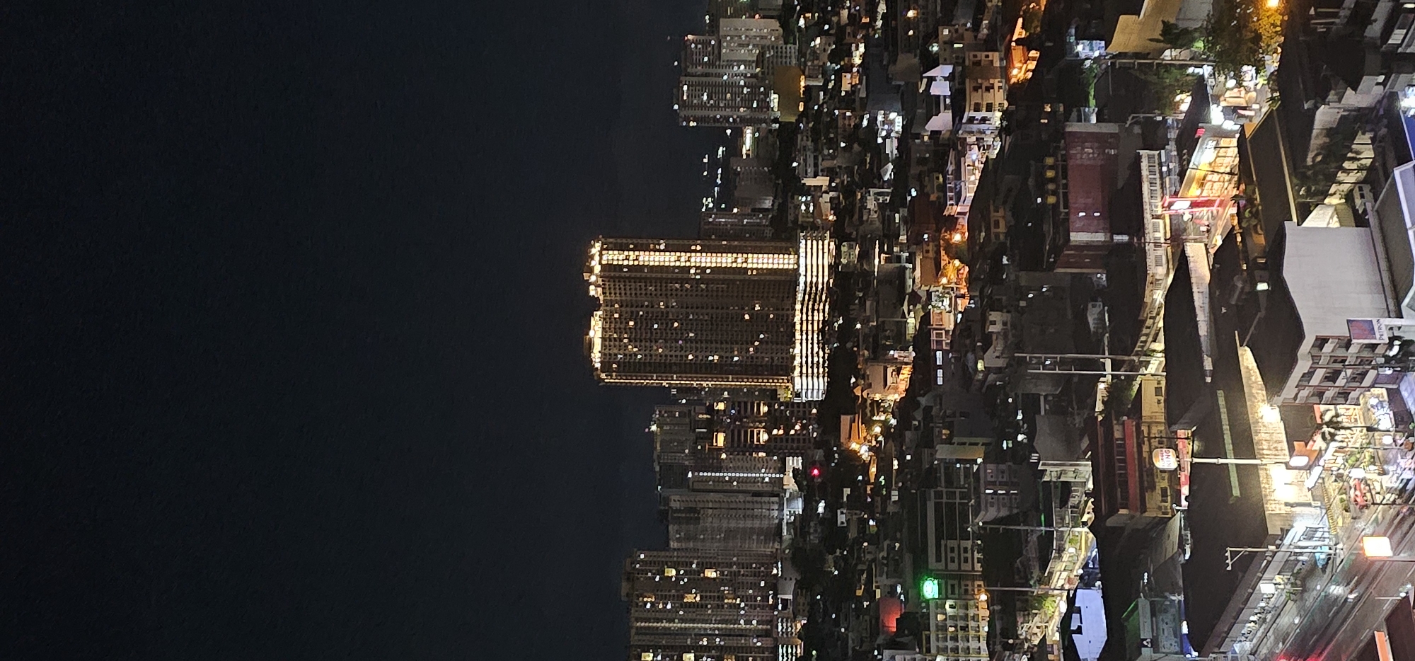 Makati at night: highways, city lights, and street activity