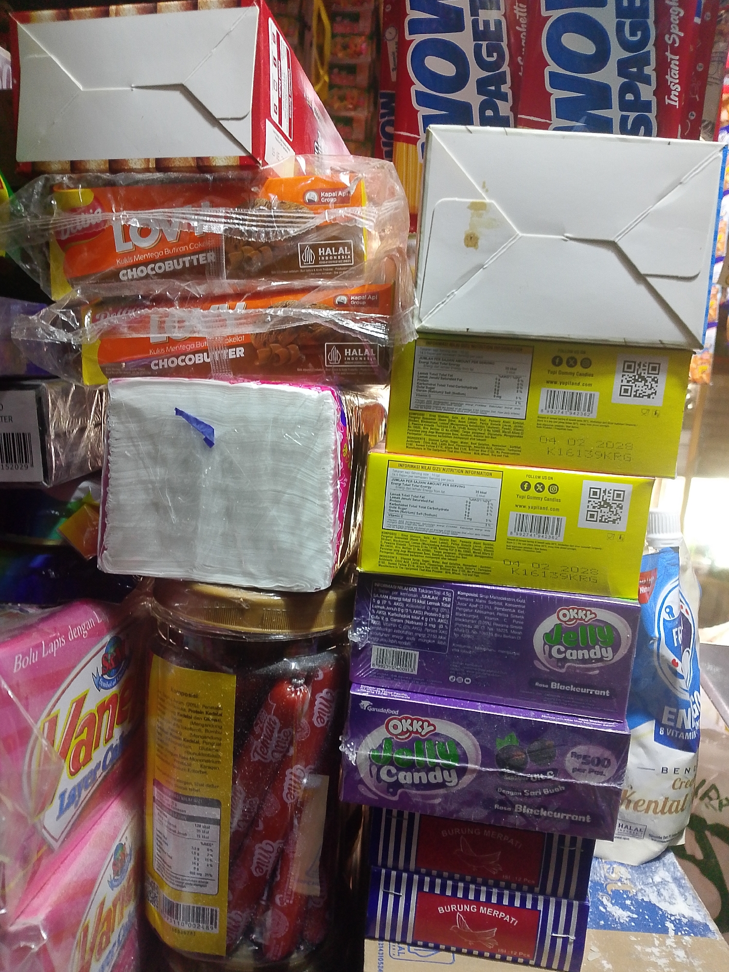 Inside a busy Palembang warung stocked with everyday goods