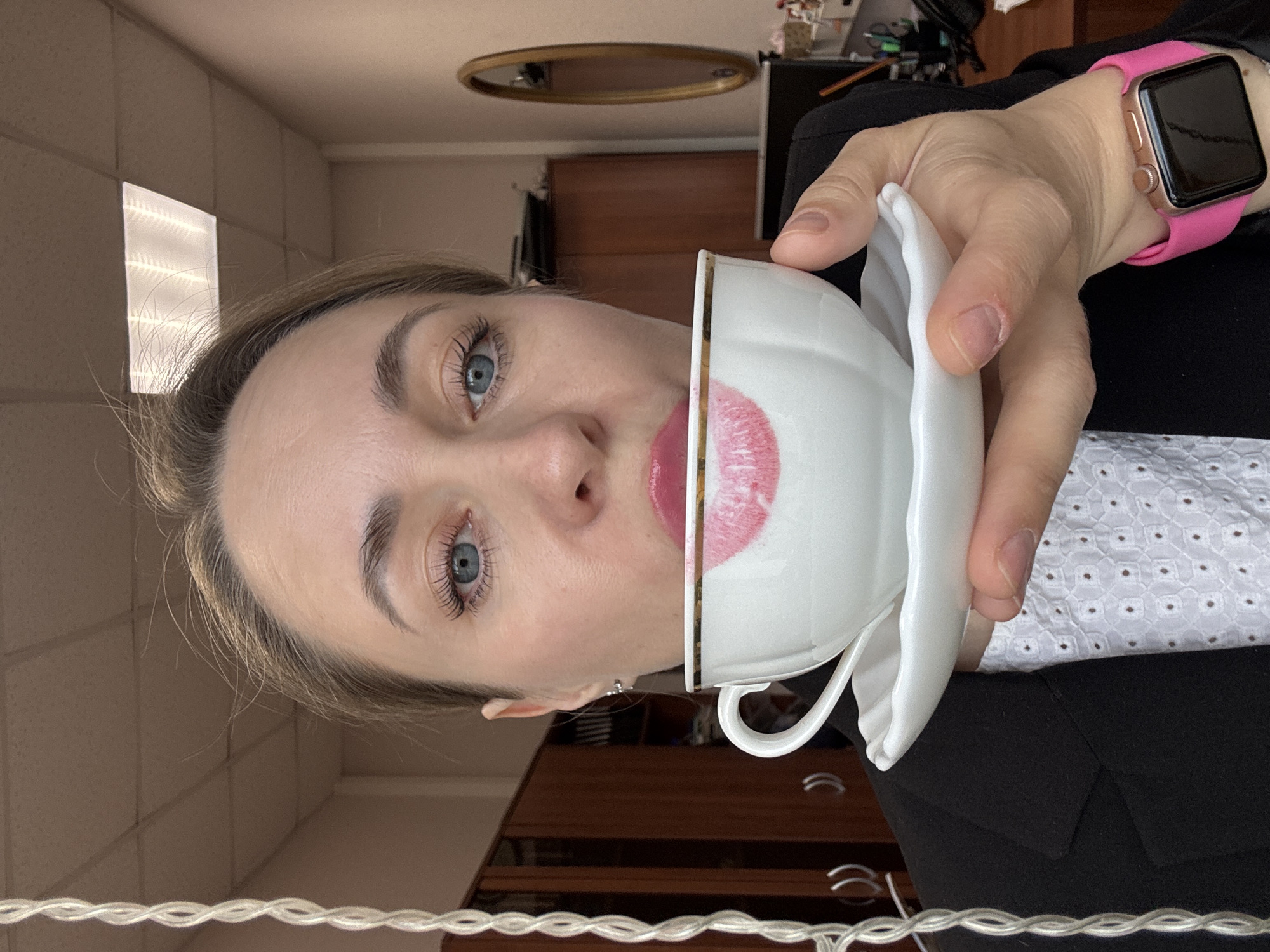 Woman photographed drinking tea in Chaikovsky, Russia