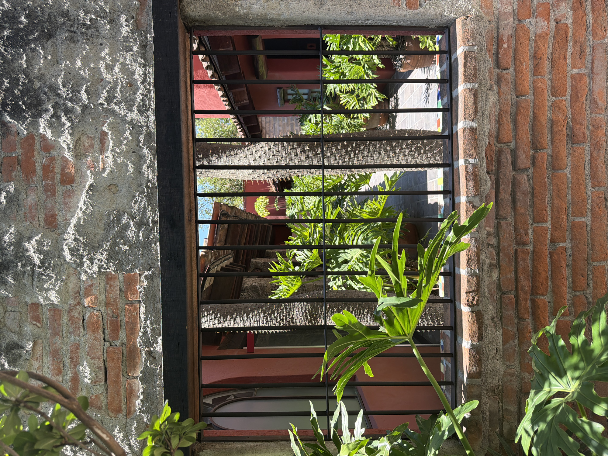 Person documents architecture, takes selfie during Puebla visit