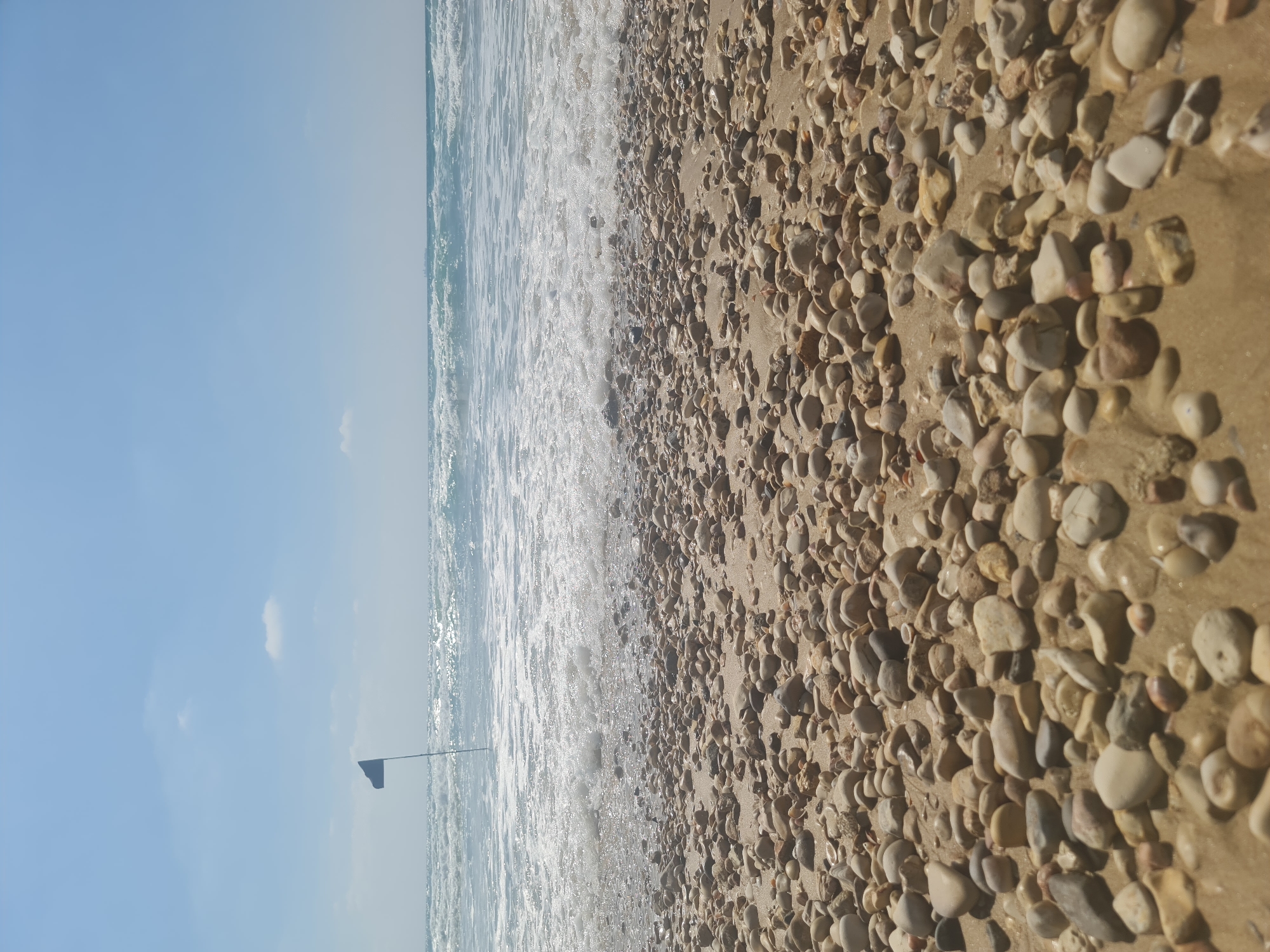 Beach scenes with sand messages and Israeli flags