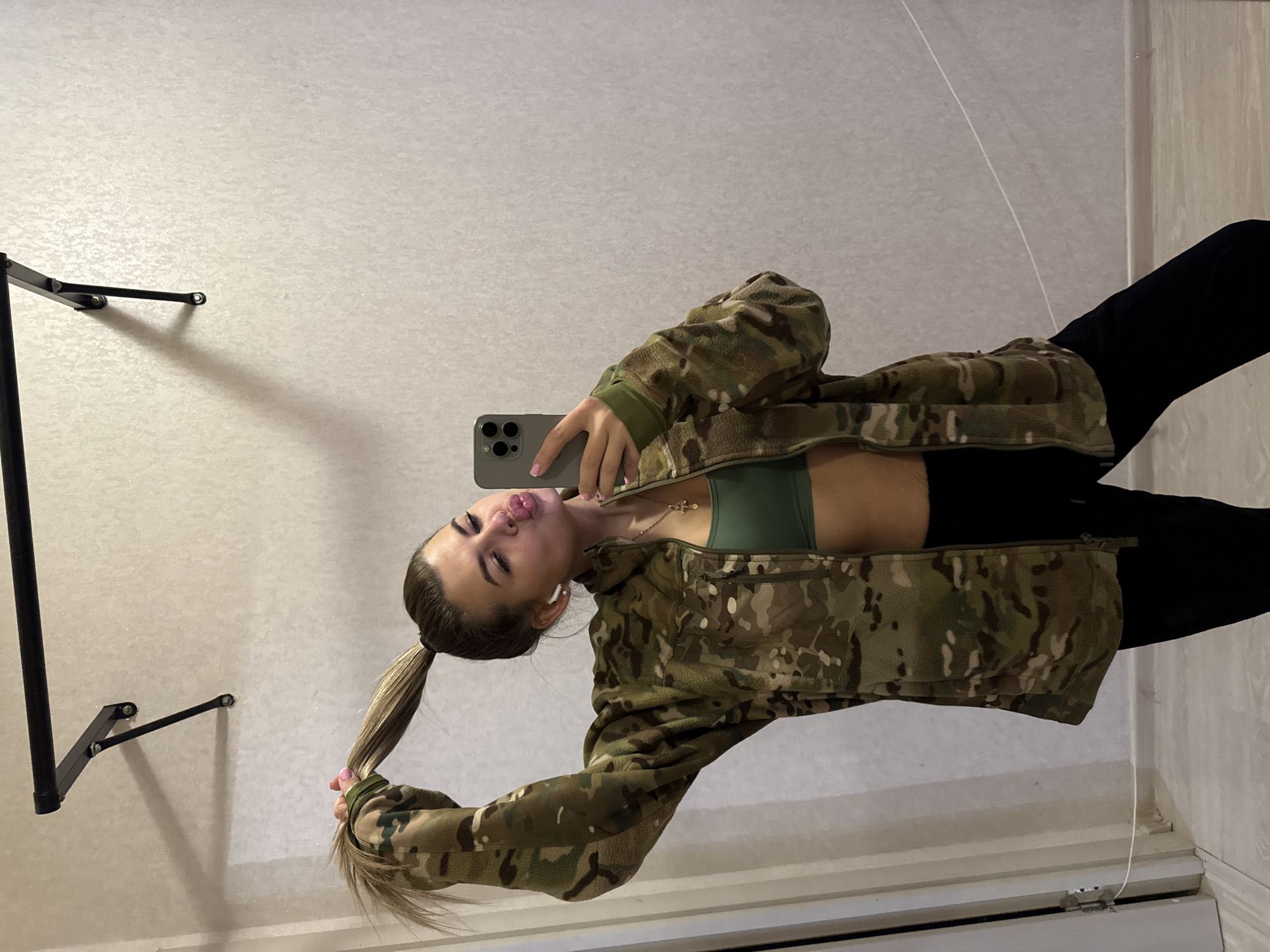 Woman documents casual afternoon with selfies and beverages in Chaikovsky