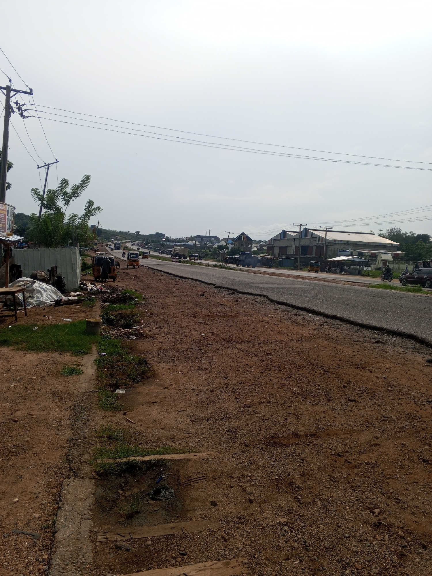 Daily life unfolds across streets and eateries in Lokoja