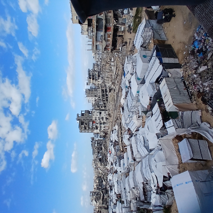 Tent settlements documented amid extensive urban destruction in Gaza