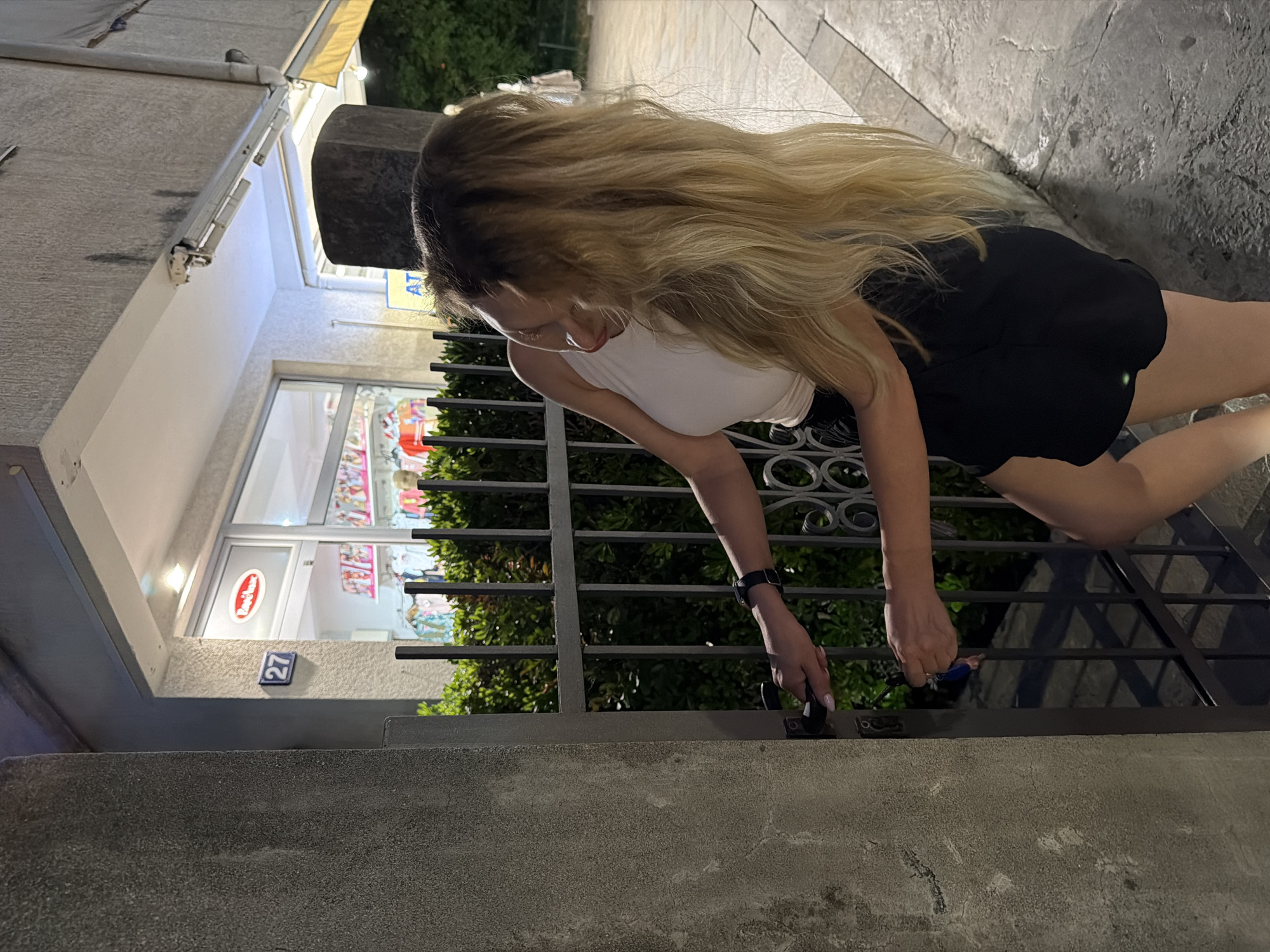 Woman's evening activities documented across Budva Montenegro tourist areas
