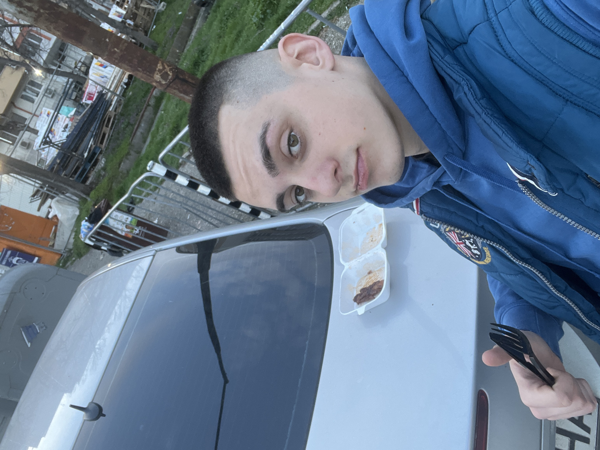 Man photographed with silver car in Burgas, Bulgaria