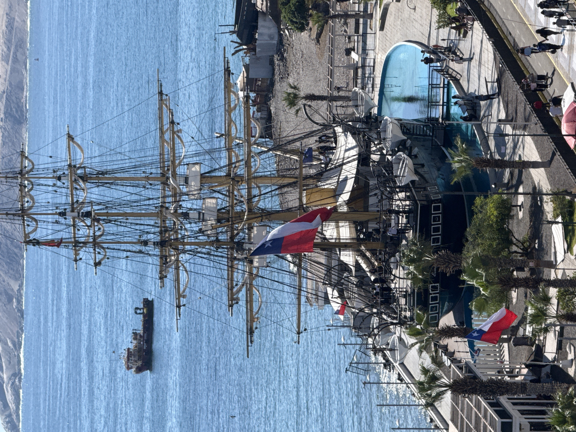 Iquique's port and coastline explored, tall ship in the bay