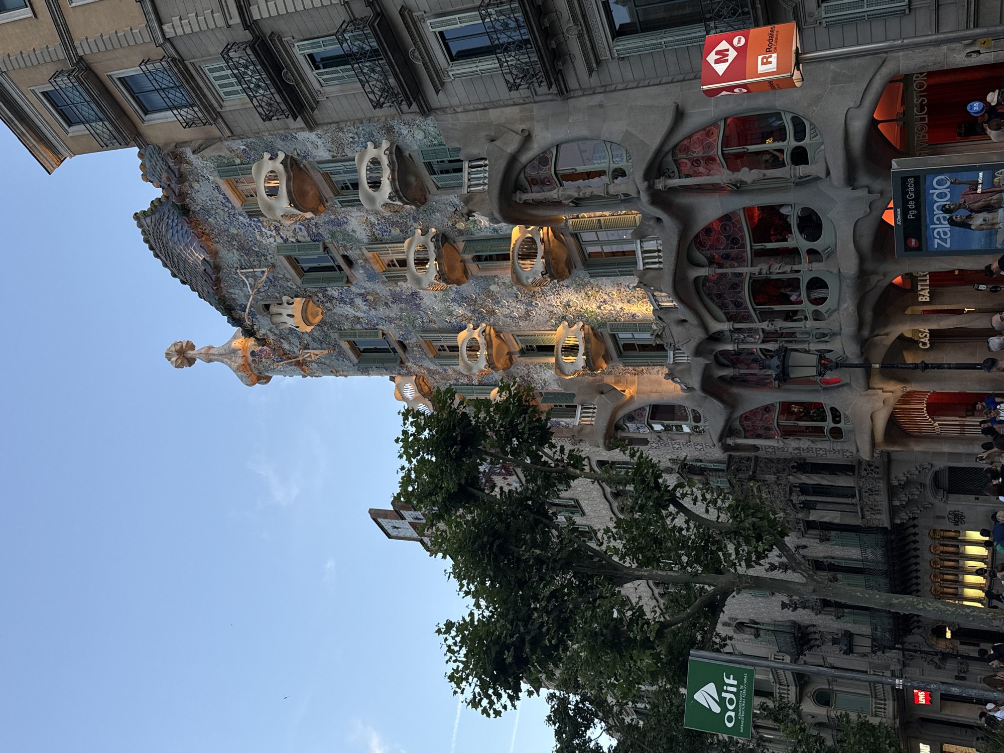 Crowds gather along Barcelona's Passeig de Gràcia near landmarks