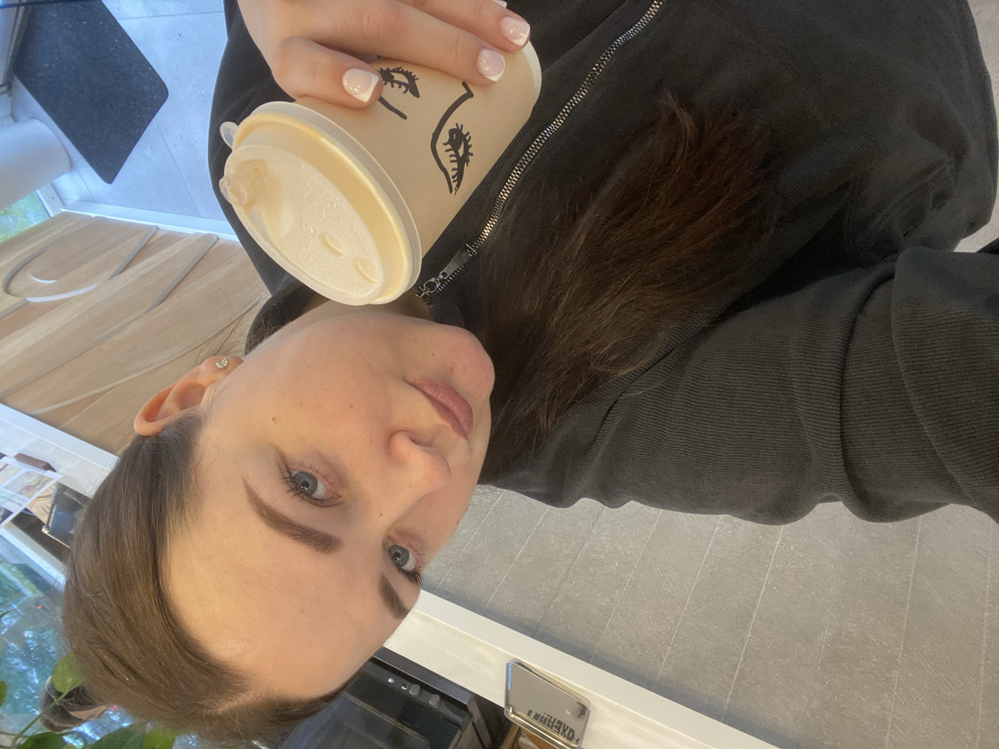 Morning cafe visit documented in Sochi with pastries and plants
