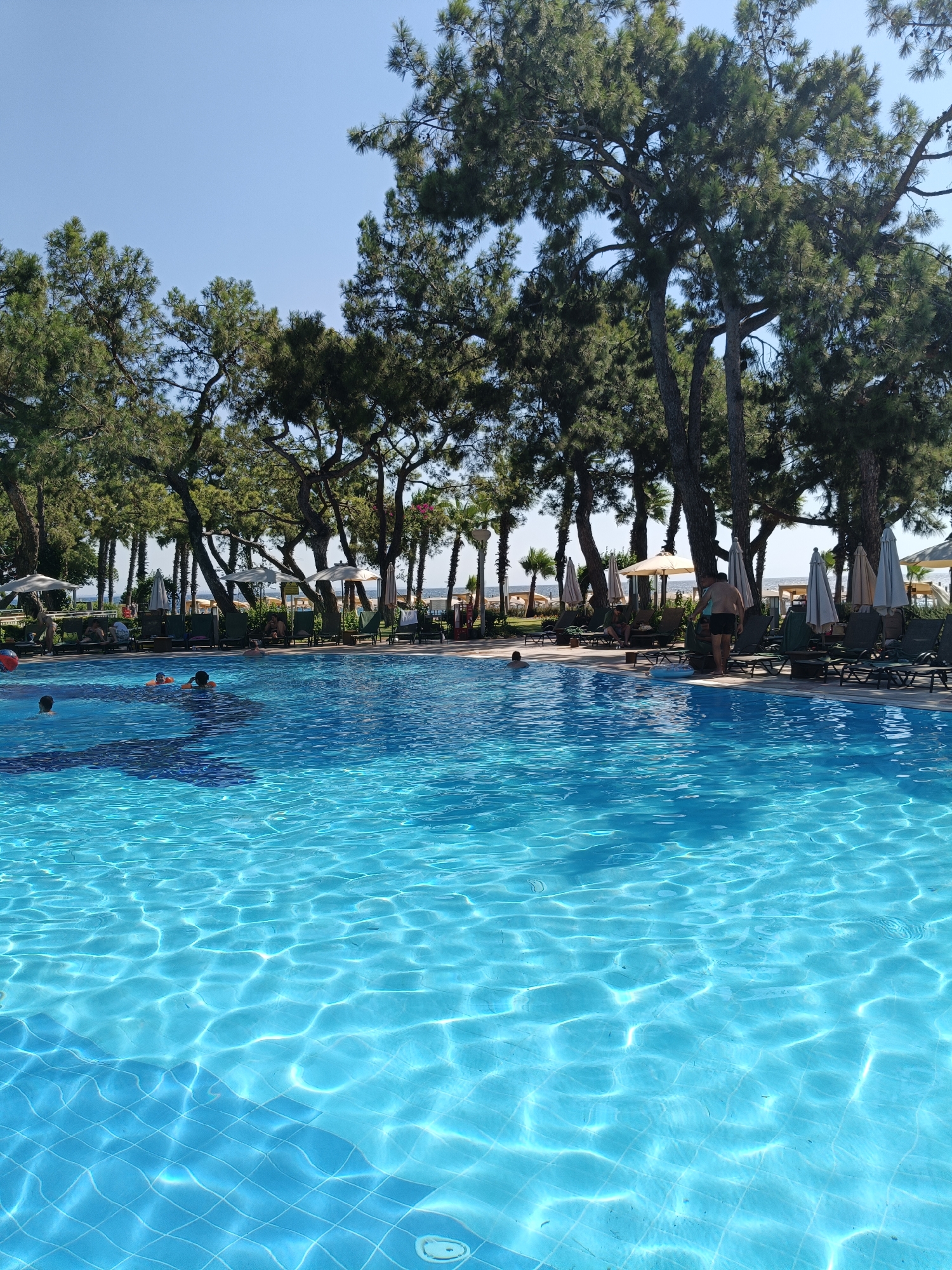 Sunny resort pool day in Kemer, Turkey