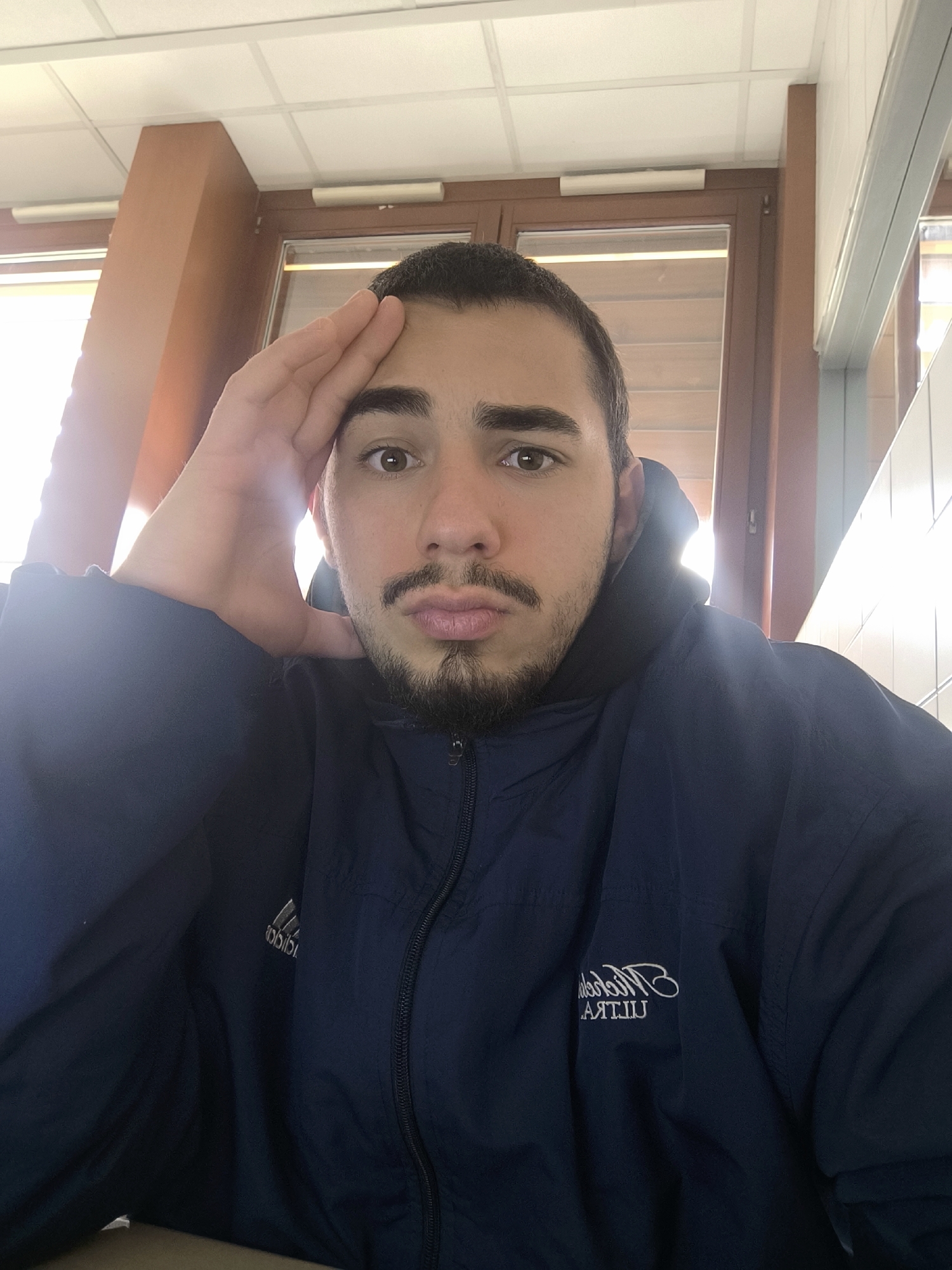 Man takes selfies in Adidas jacket in Schiltigheim