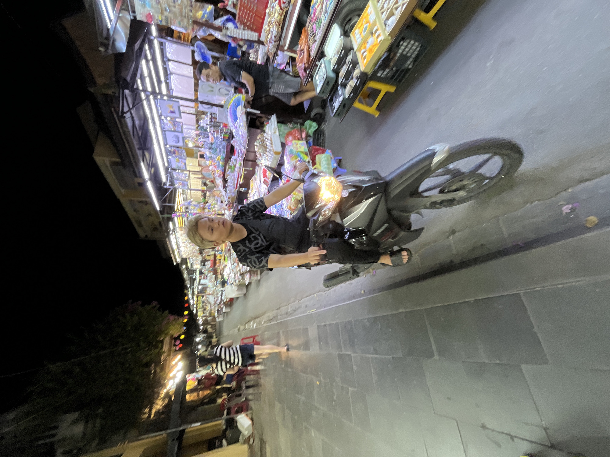 Evening street life documented in historic Hội An tourist district