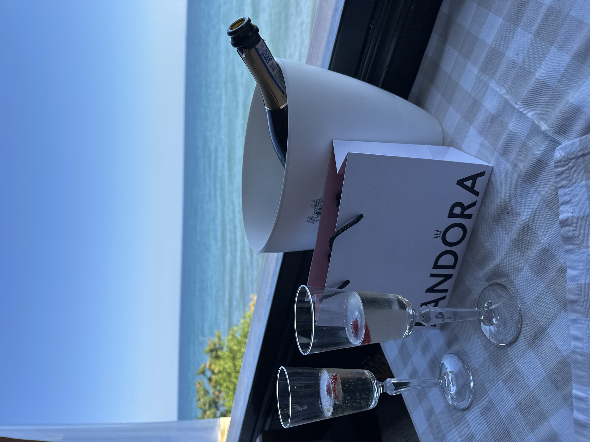 Prosecco and a Pandora bag on a sunny Nesebar afternoon