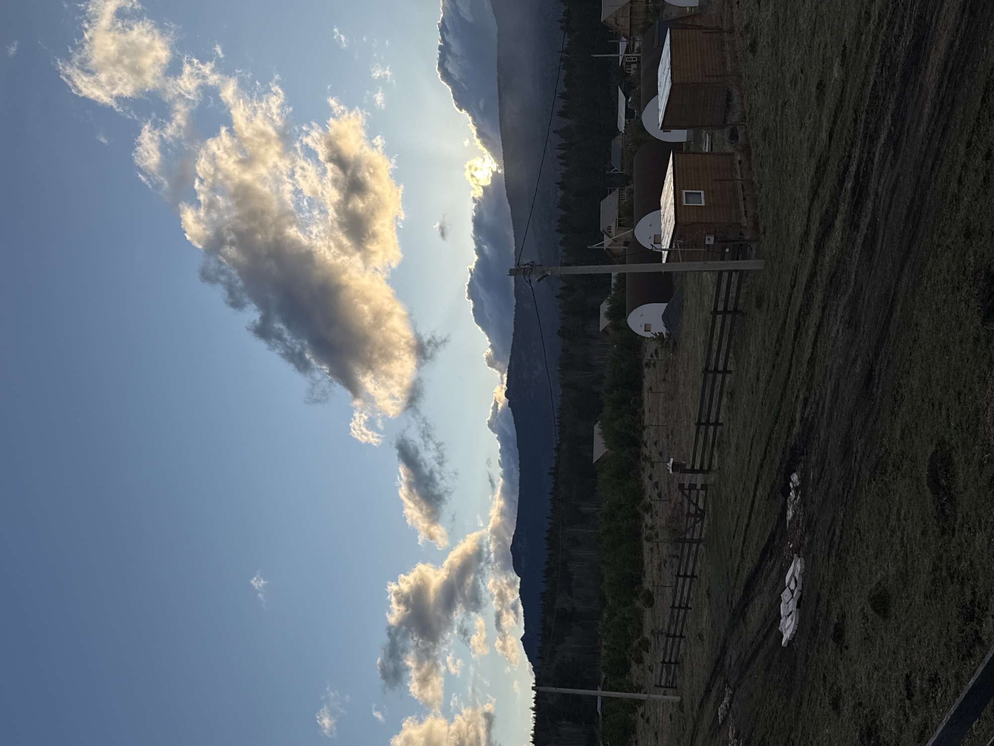 Rural cabins and mountain landscape documented in Tyulyuk, Russia