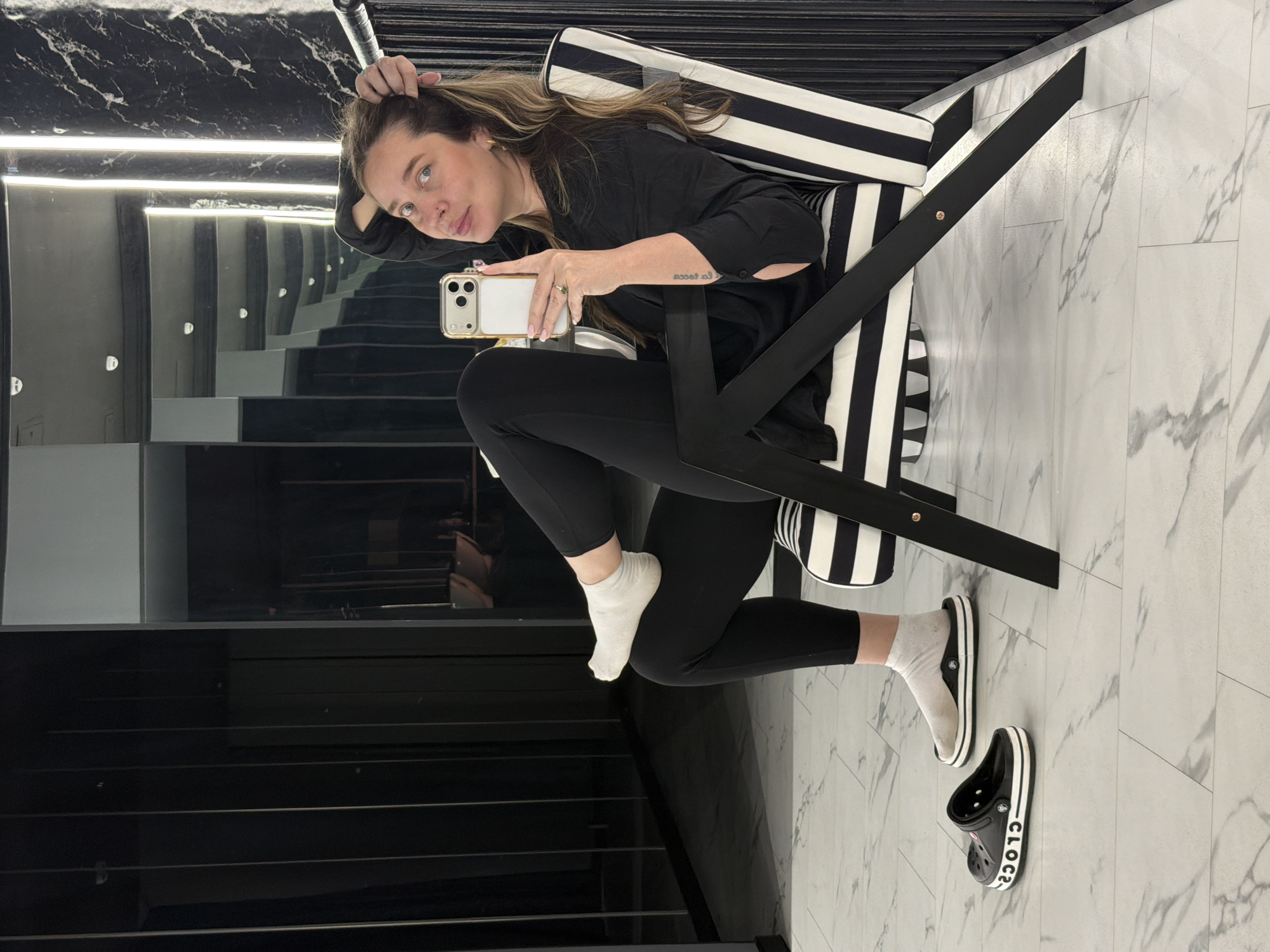 Woman Takes Selfie in Modern Moscow Interior