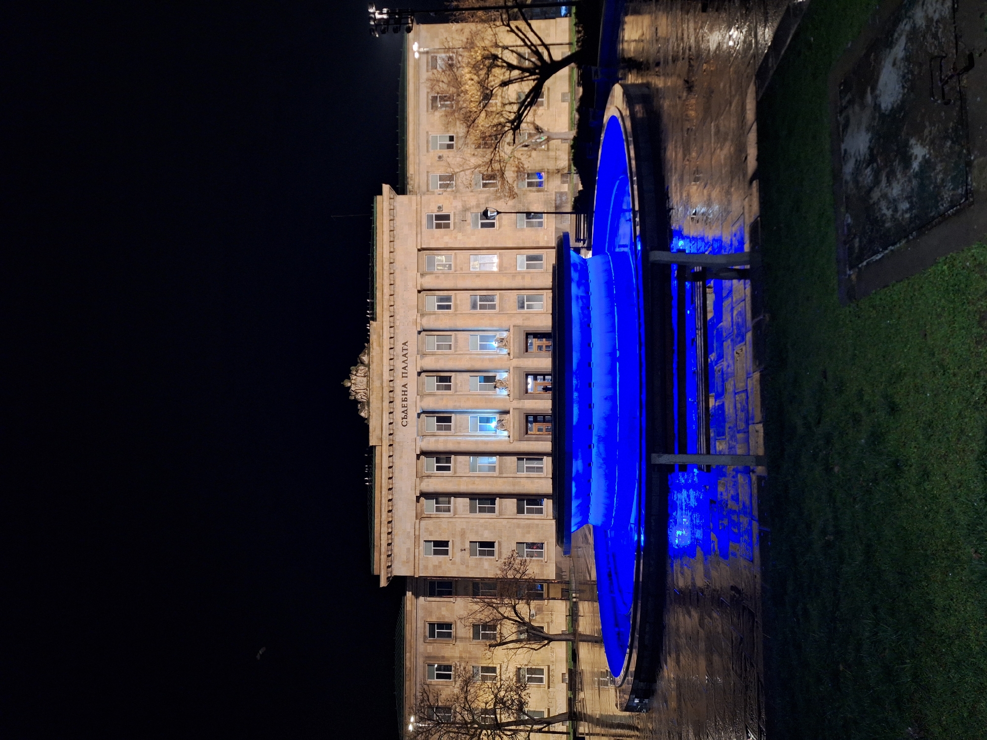 Nighttime photography captures illuminated civic landmarks in Ruse, Bulgaria