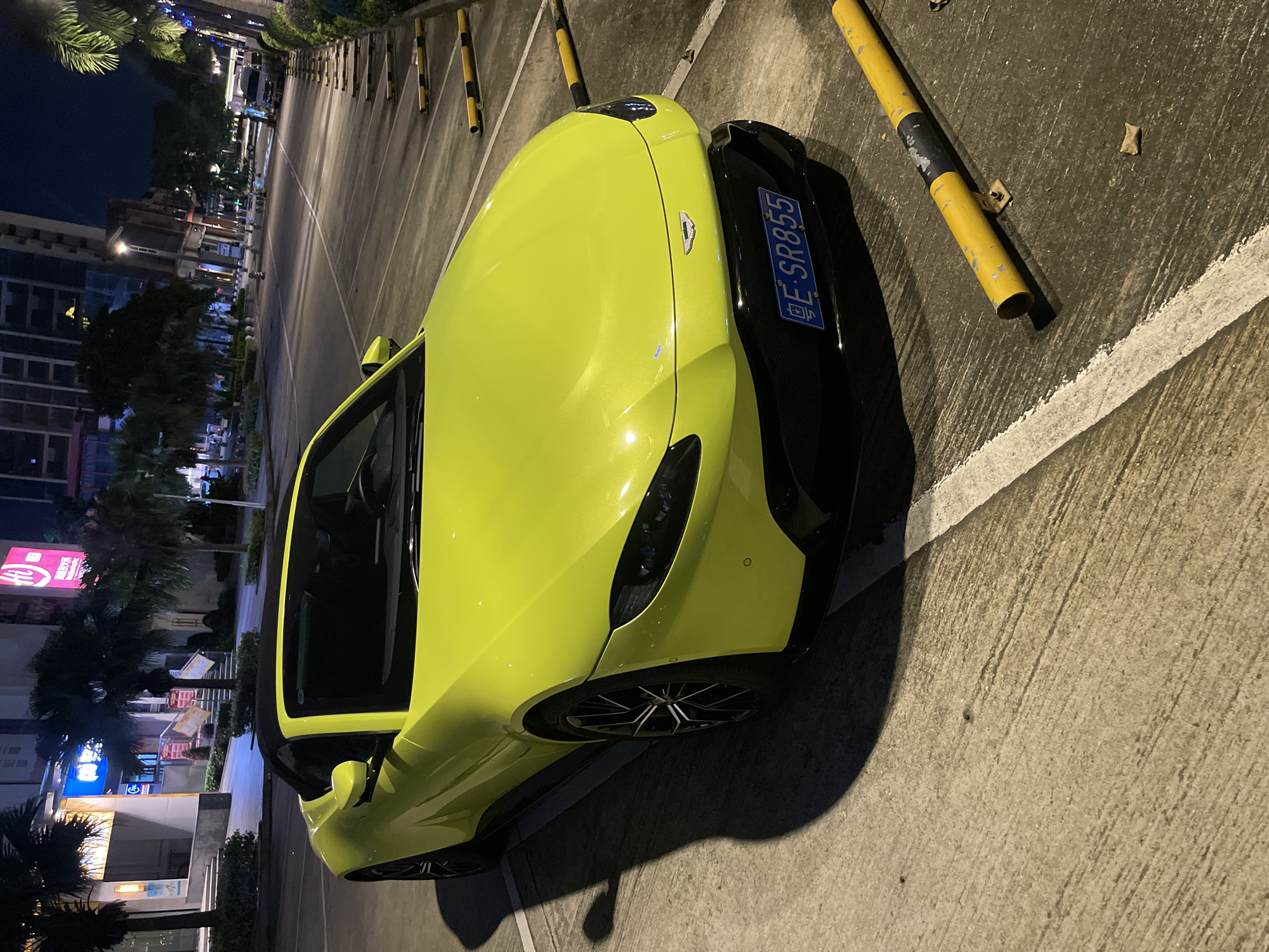 Yellow Aston Martin Vantage spotted parked in Panyu District at night