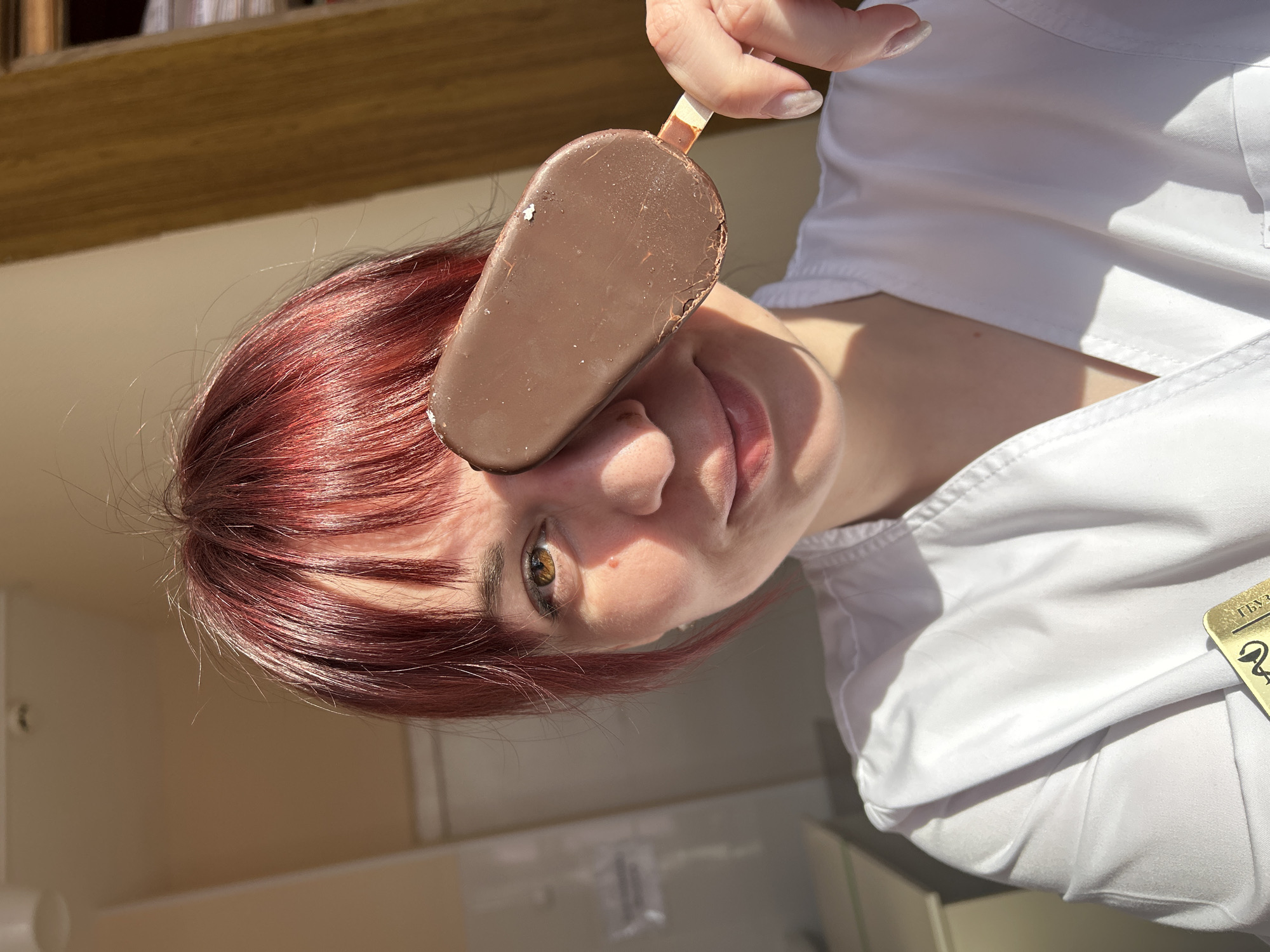 Medical worker enjoys ice cream break at workplace