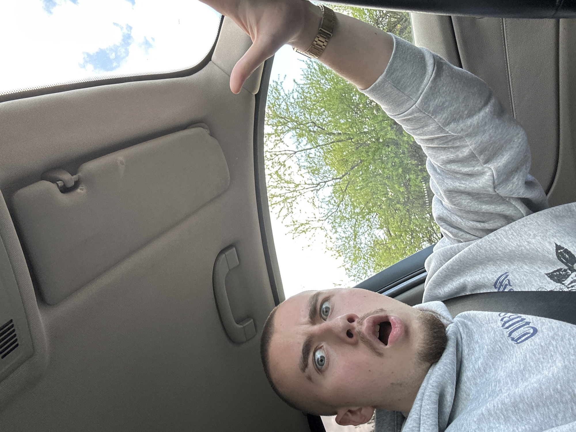 Man shows surprised reaction inside car in Sofia