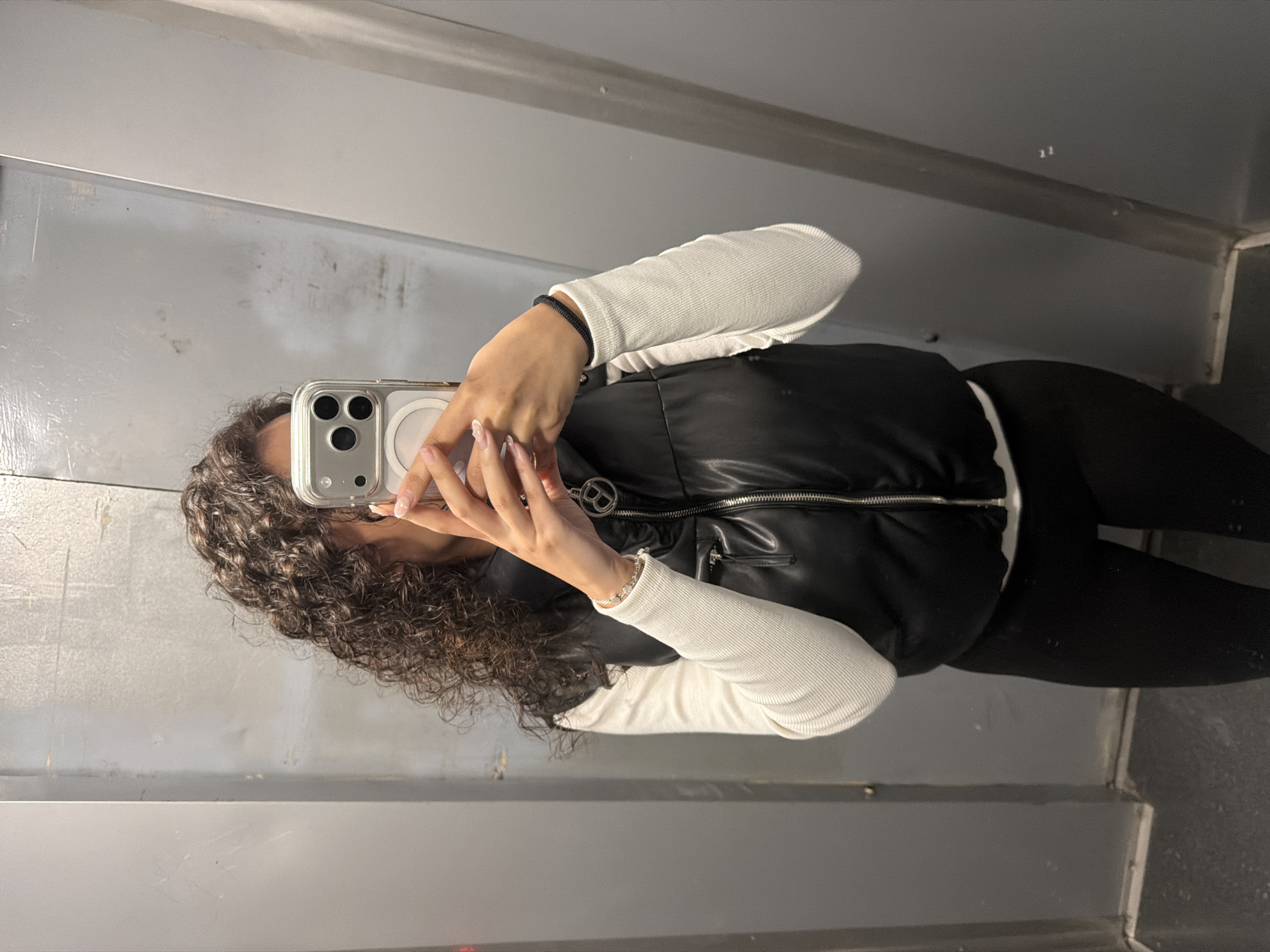 Woman takes elevator selfie in Sofia