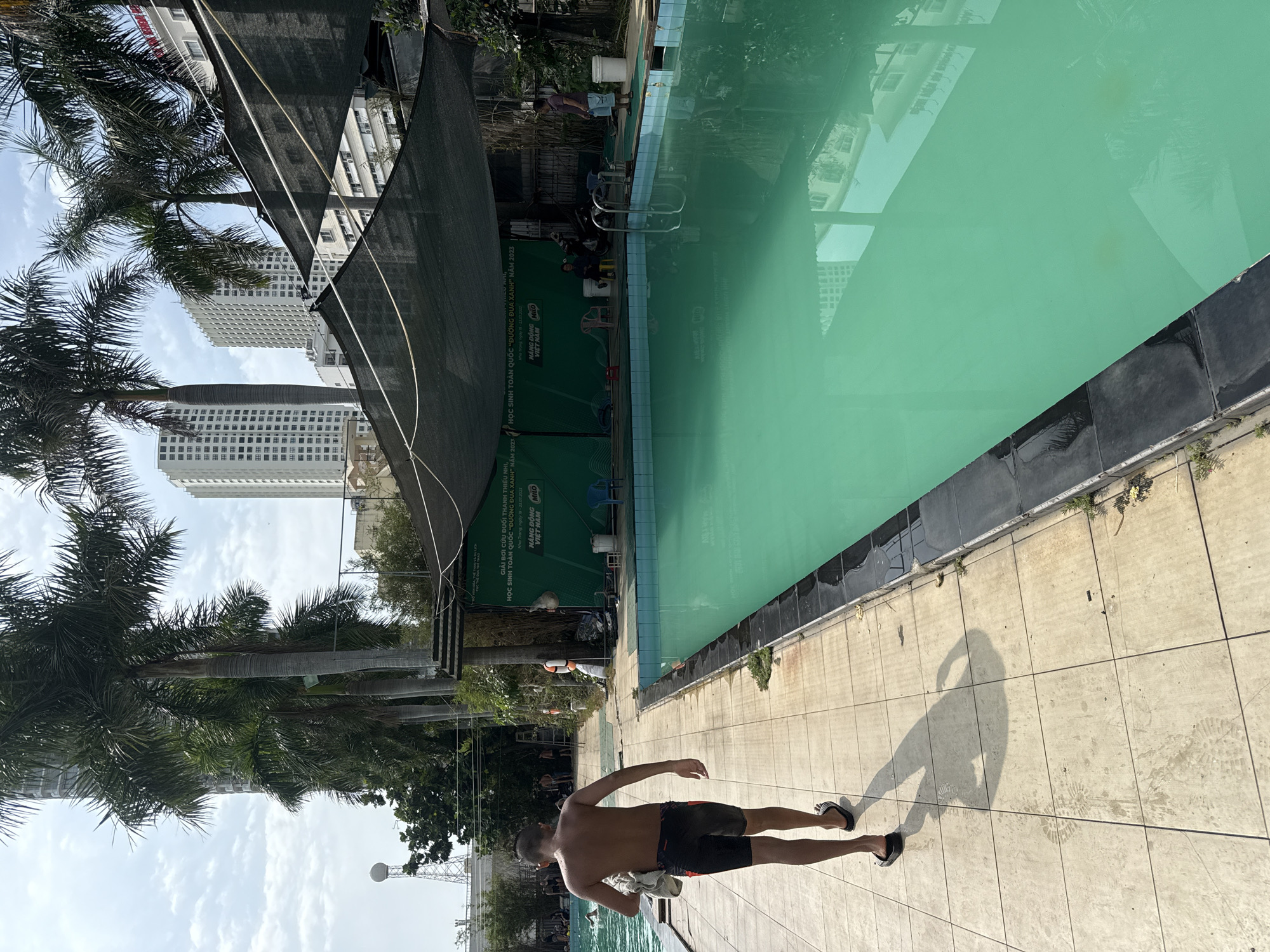 Late-night scenes documented around Nha Trang Ward swimming pools, cafes