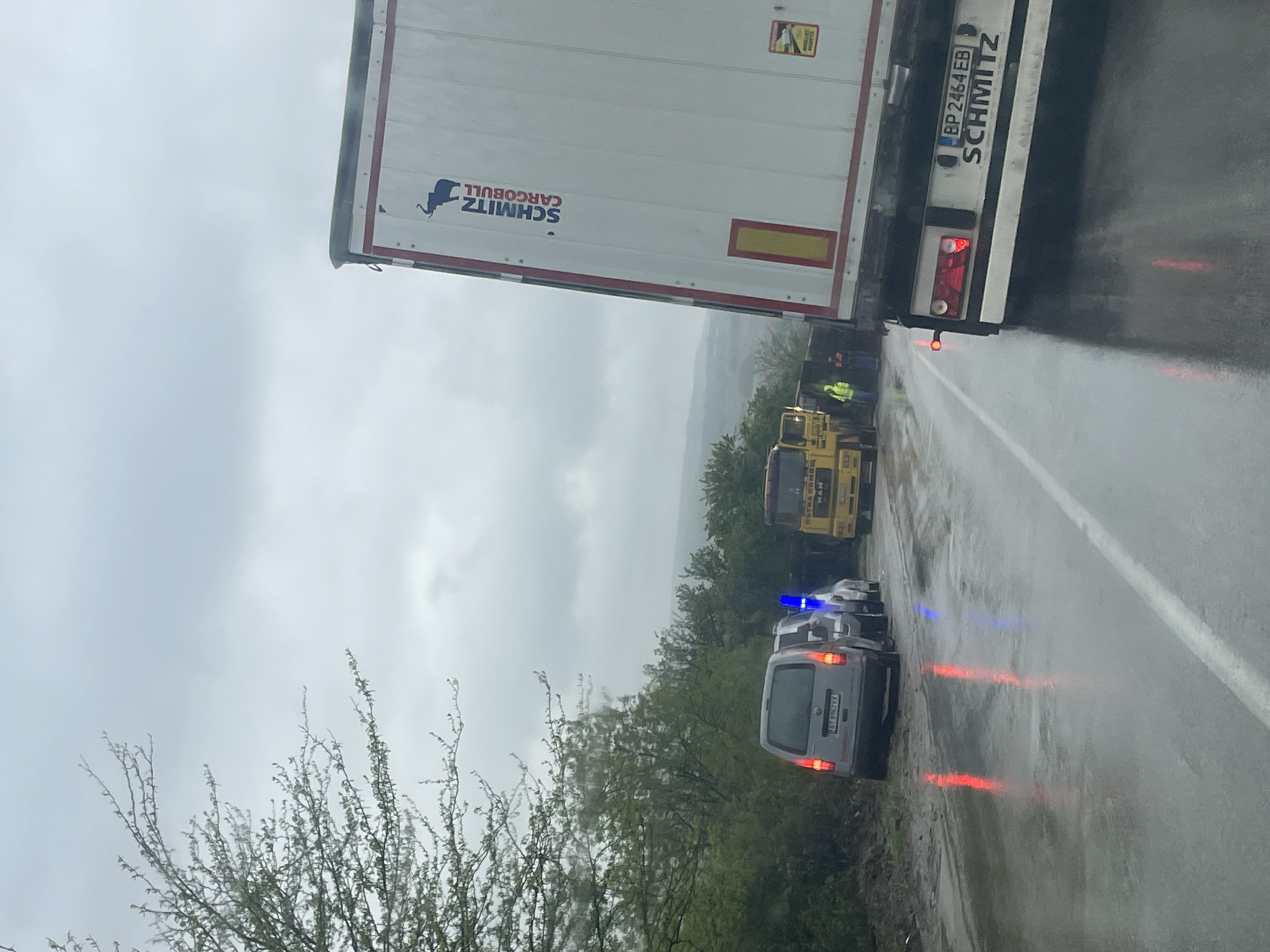 Truck spotted on wet roads in Strahilovo during rainy weather