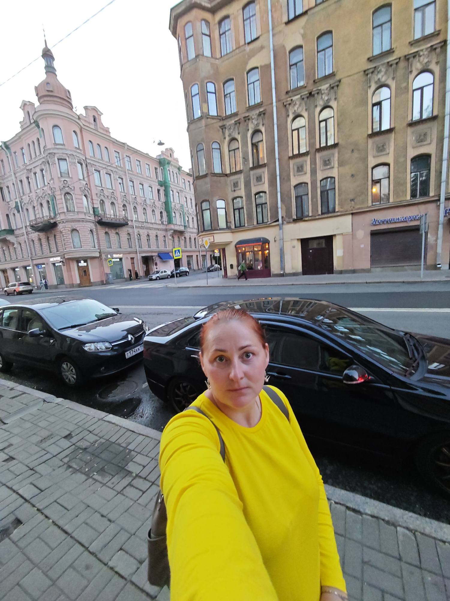 Woman documents Saint Petersburg afternoon with selfies across city