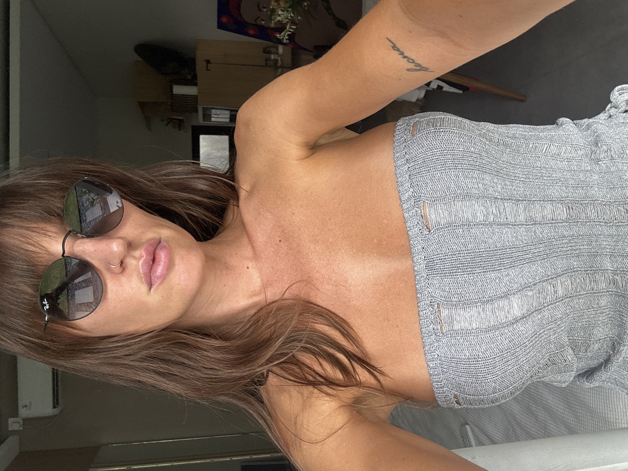 Woman in grey top observed indoors in Canggu
