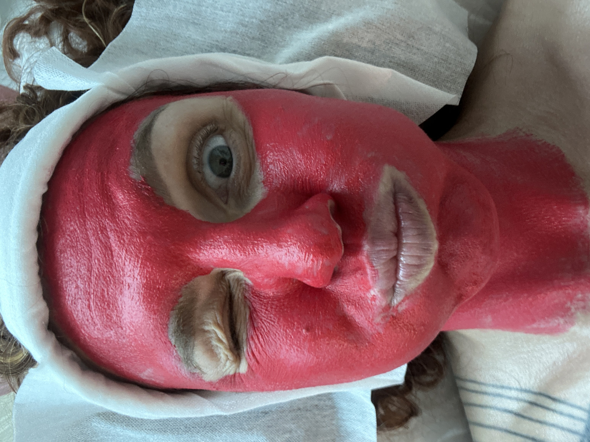 Woman receives facial treatment session at Sochi spa facility