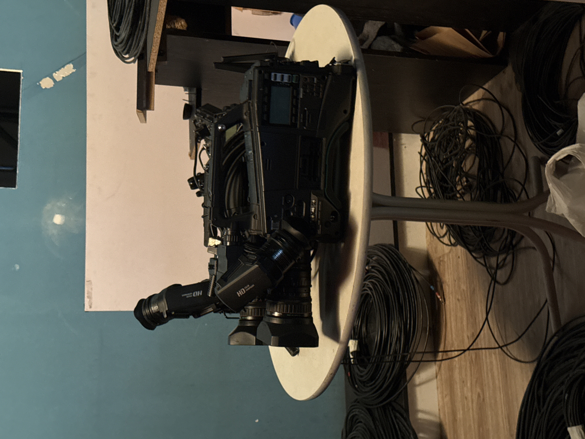 Eclectic mix of gear, signage, and everyday objects across one session