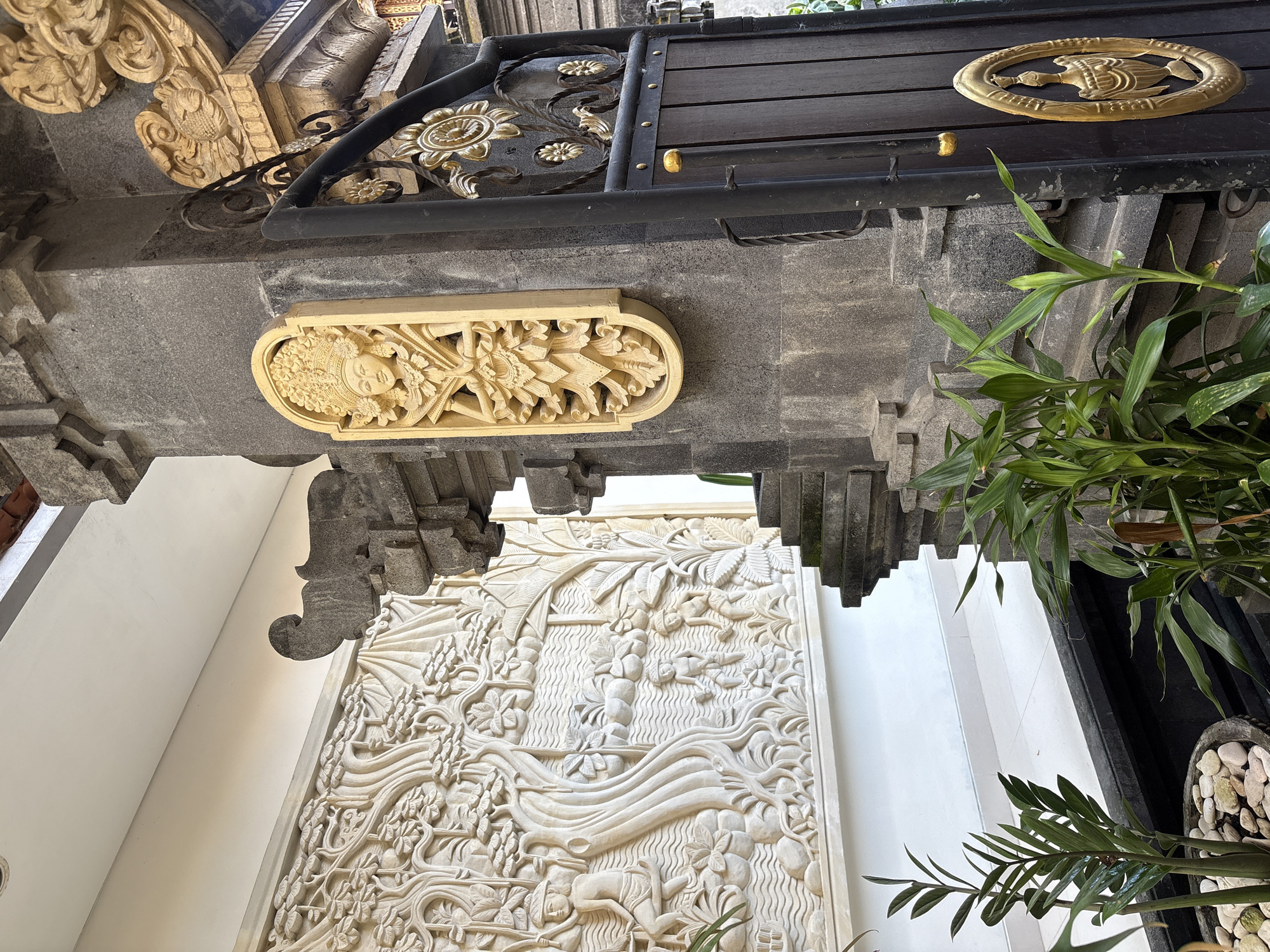 Temple visit with ornate stone carvings and decorated Ganesha statues