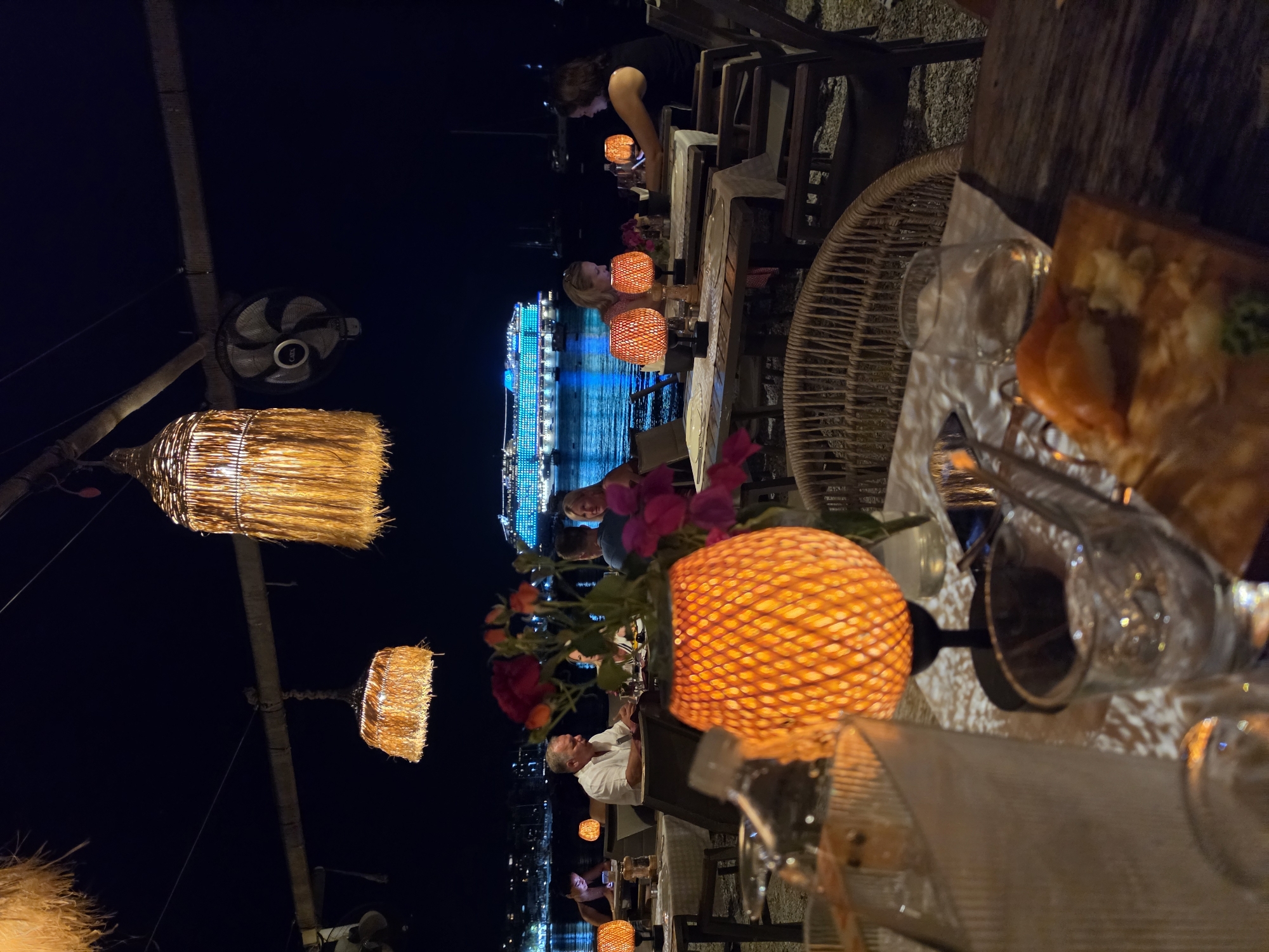 Sunset dinner on the Bodrum waterfront, cruise ship in view