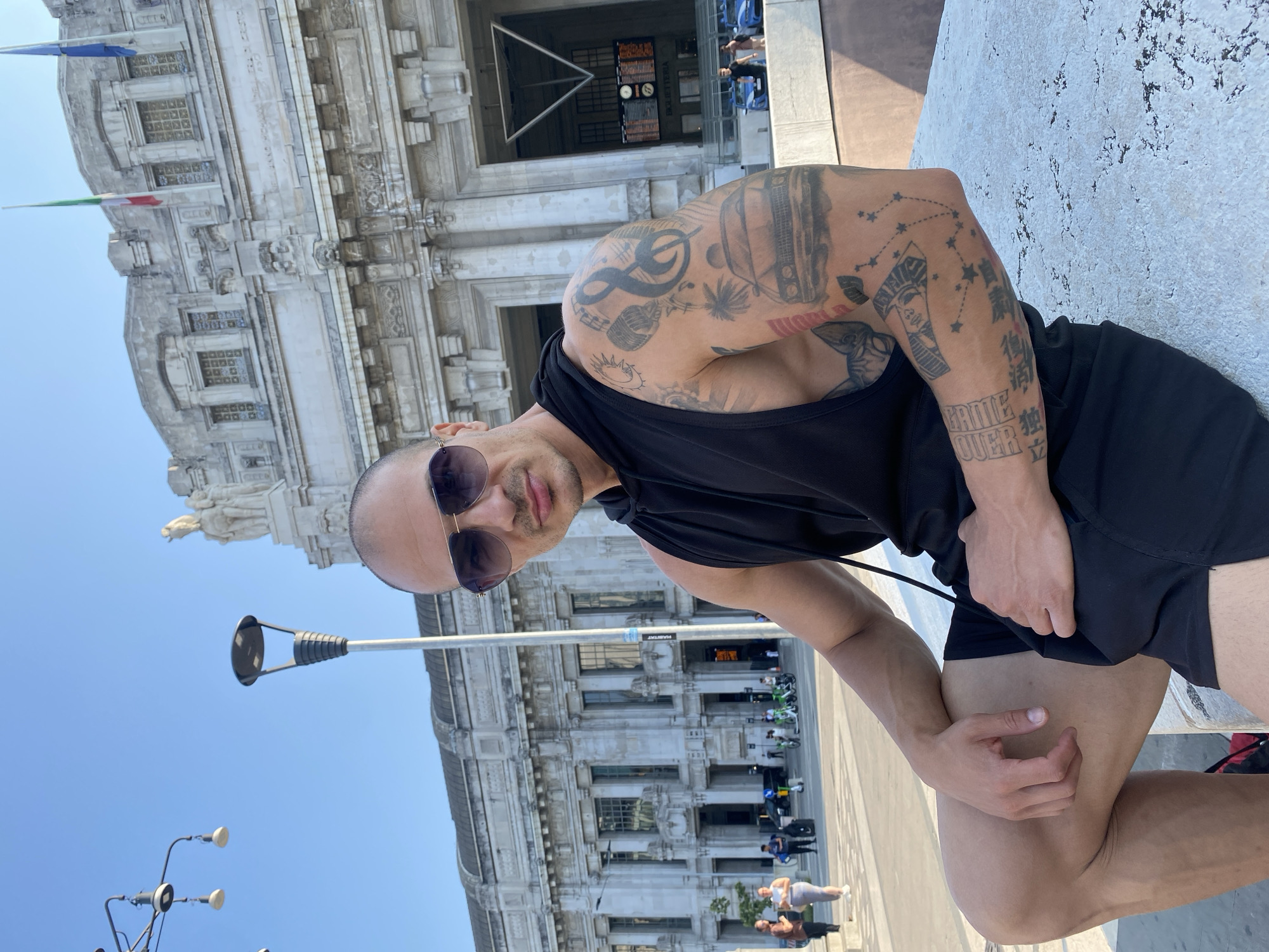 Hanging out near Milan's baseball sculpture on a summer morning