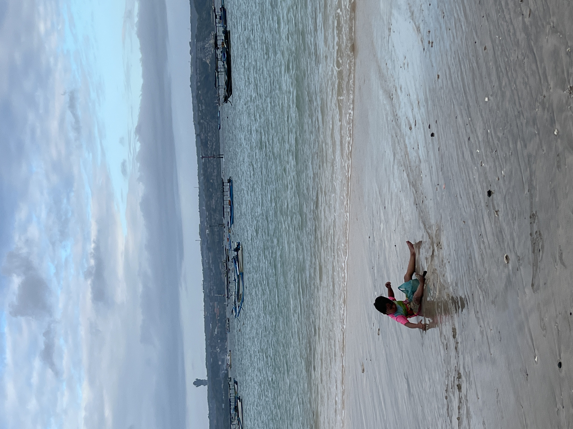 Kuta Beach morning: camel rides, shoreline play, and coastal tourism