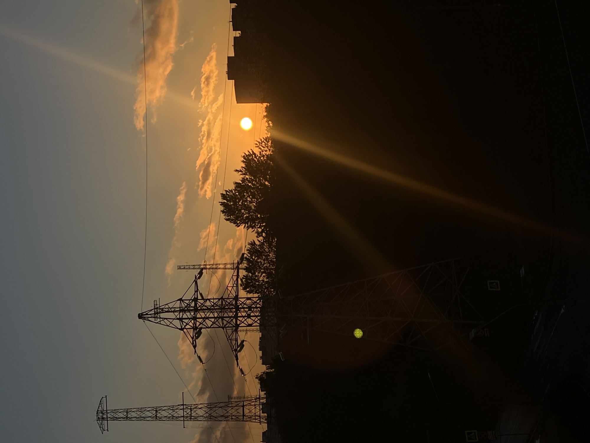 Saint Petersburg sunset silhouettes city skyline in warm orange light