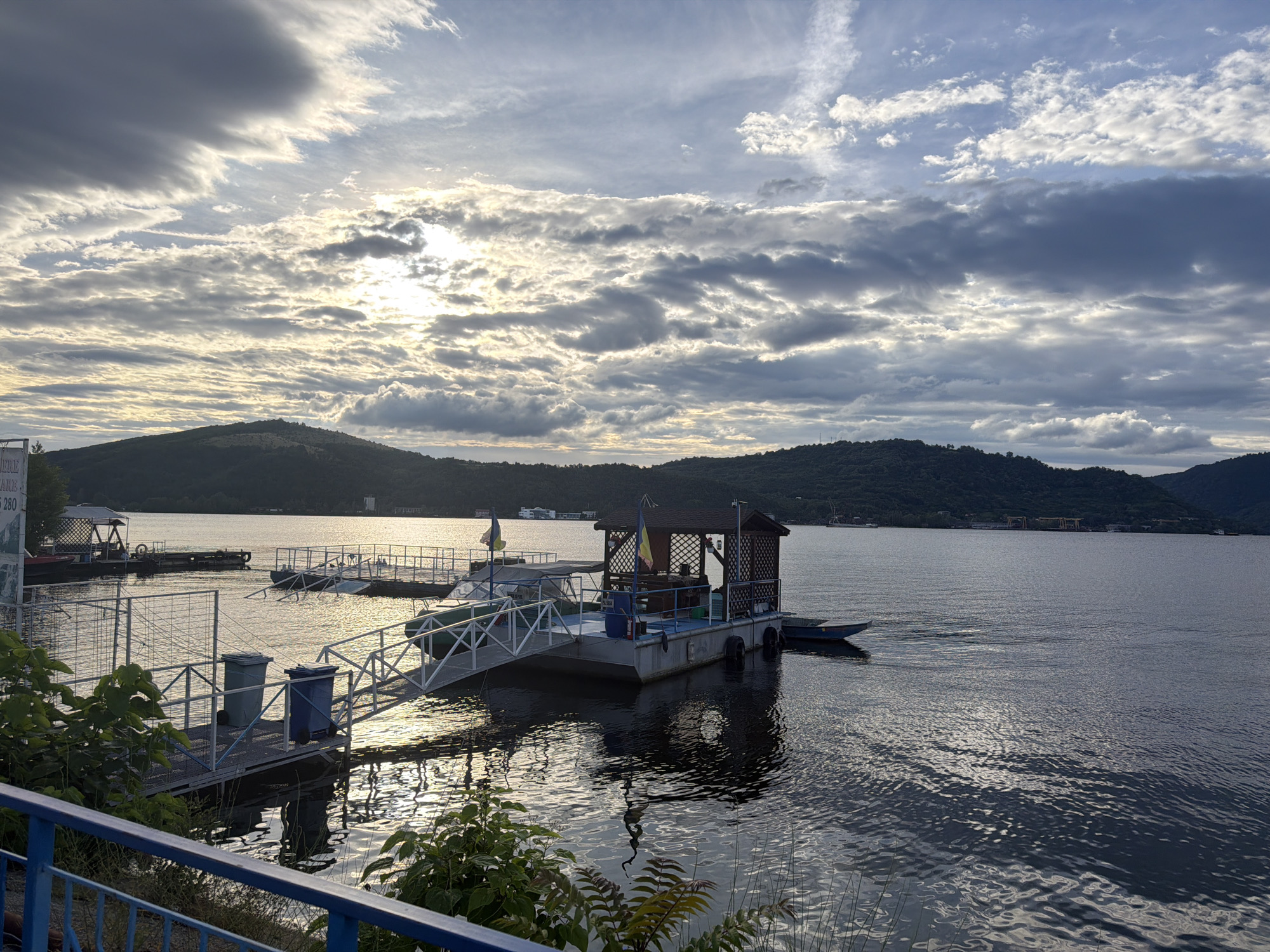 Sunset witnessed over Orșova waterfront amid dramatic clouds