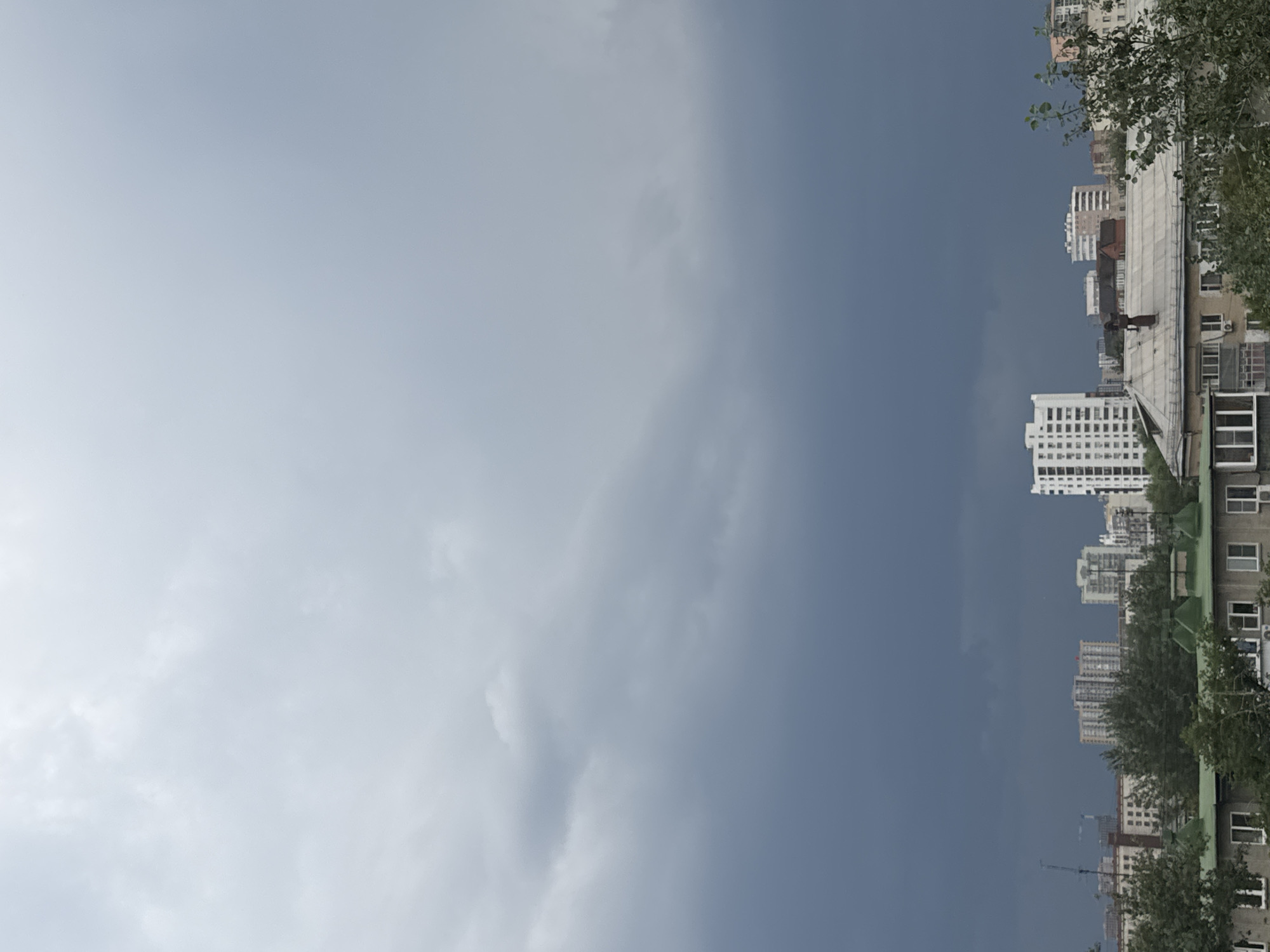 Storm clouds over Chelyabinsk, casual indoor moments alongside.
