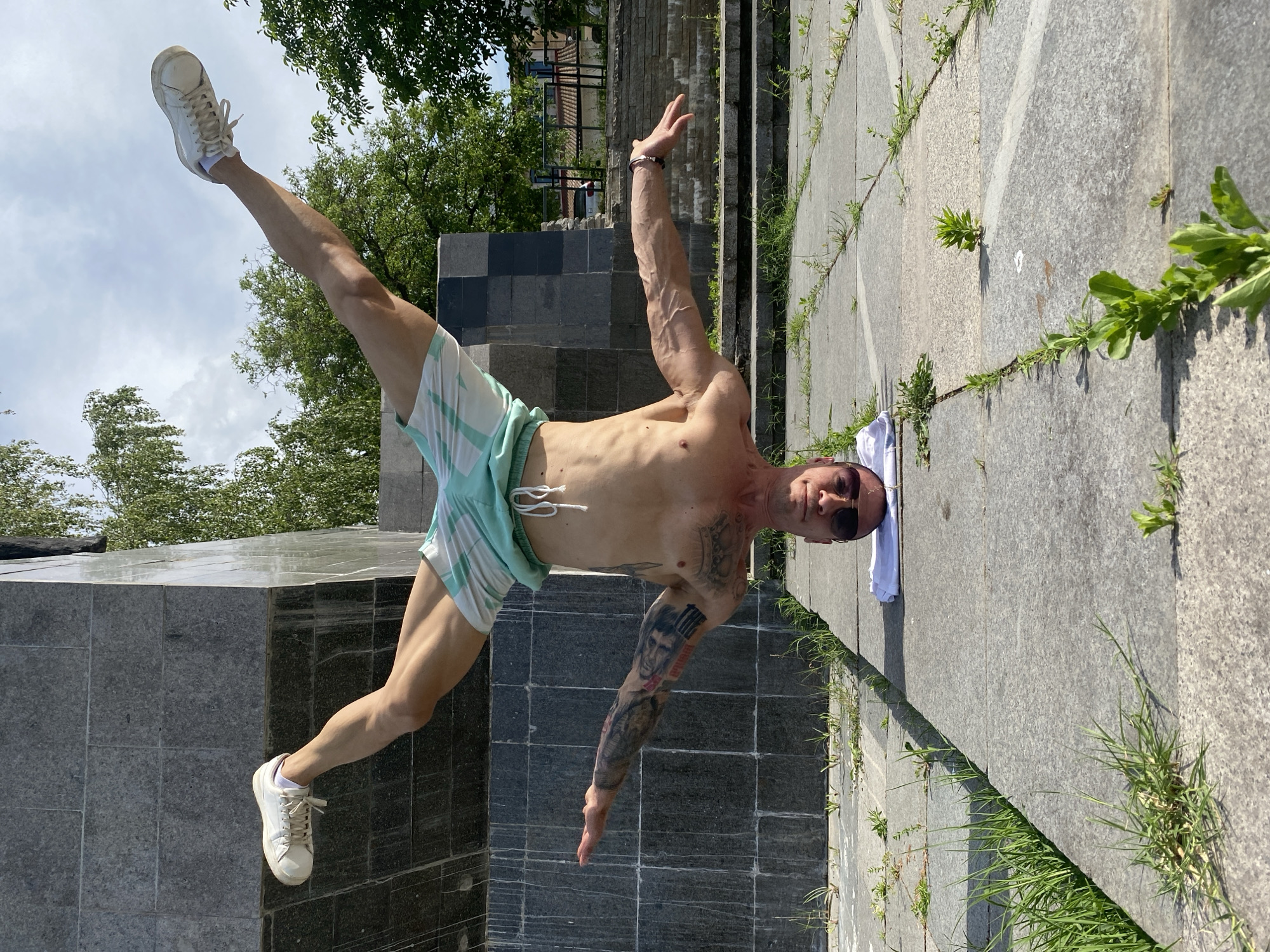 Man exercises near monuments in Pleven, Bulgaria afternoon session