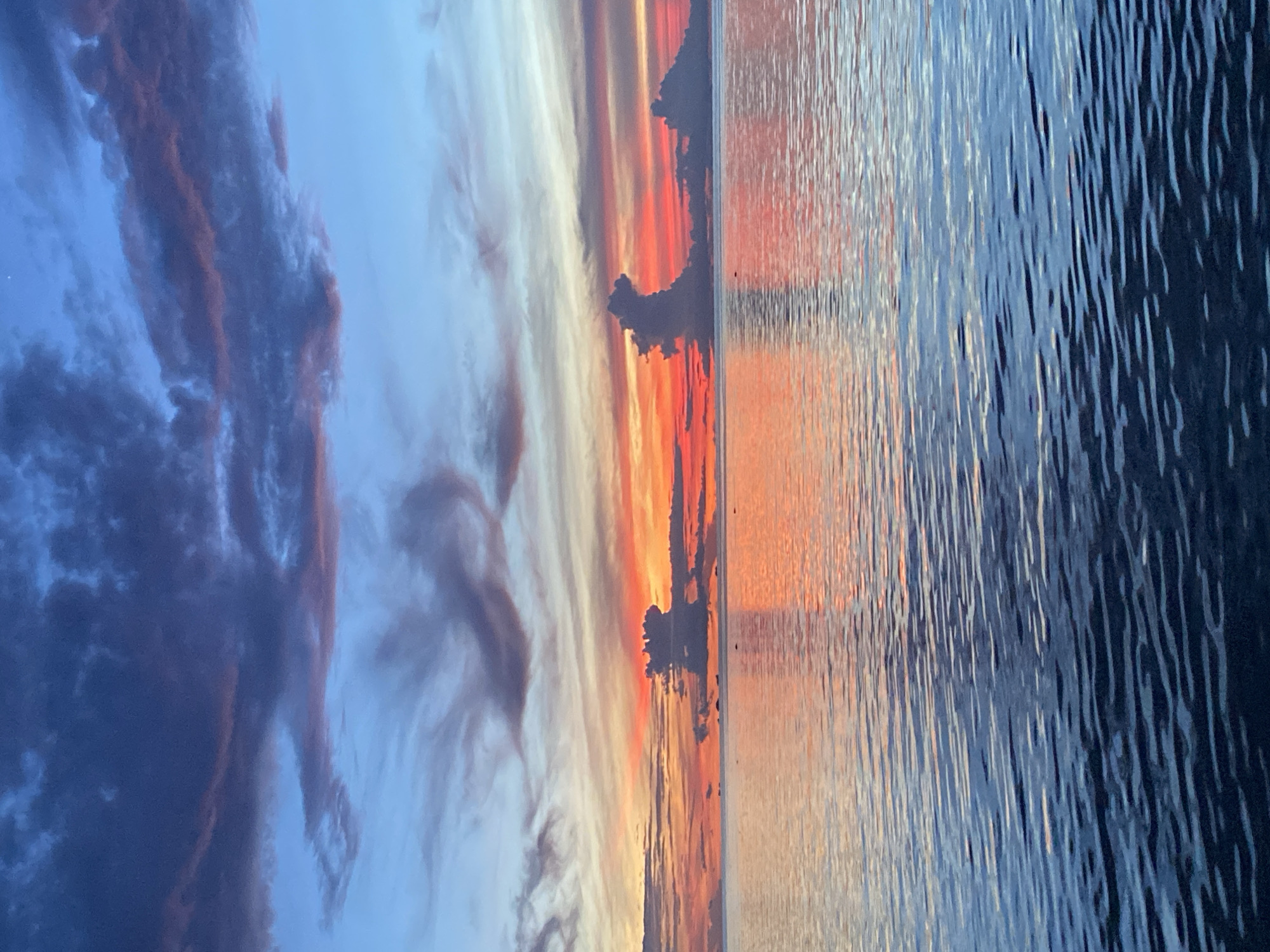 Vivid ocean sunset over Koh Phangan, caught from multiple angles