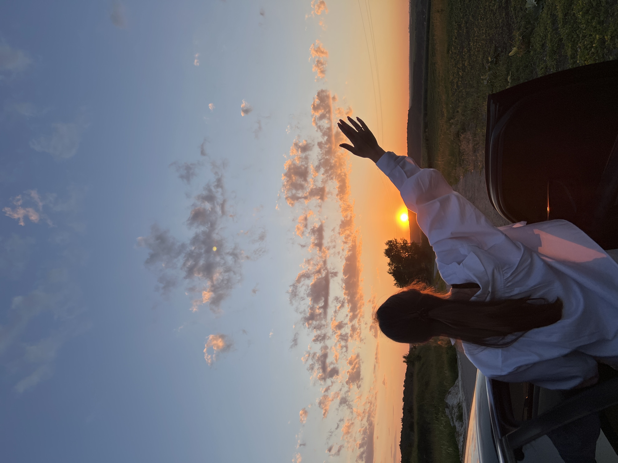 Sunset pause on a rural road in Hrabovets, Ukraine
