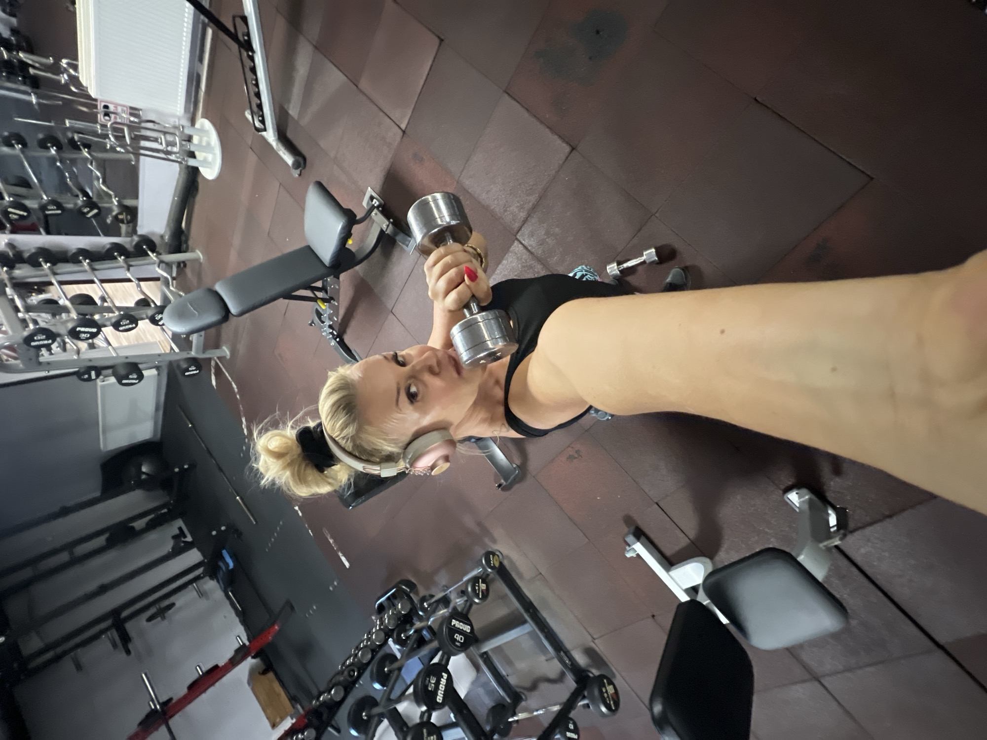 Gym selfies with dumbbells in Białystok, Poland