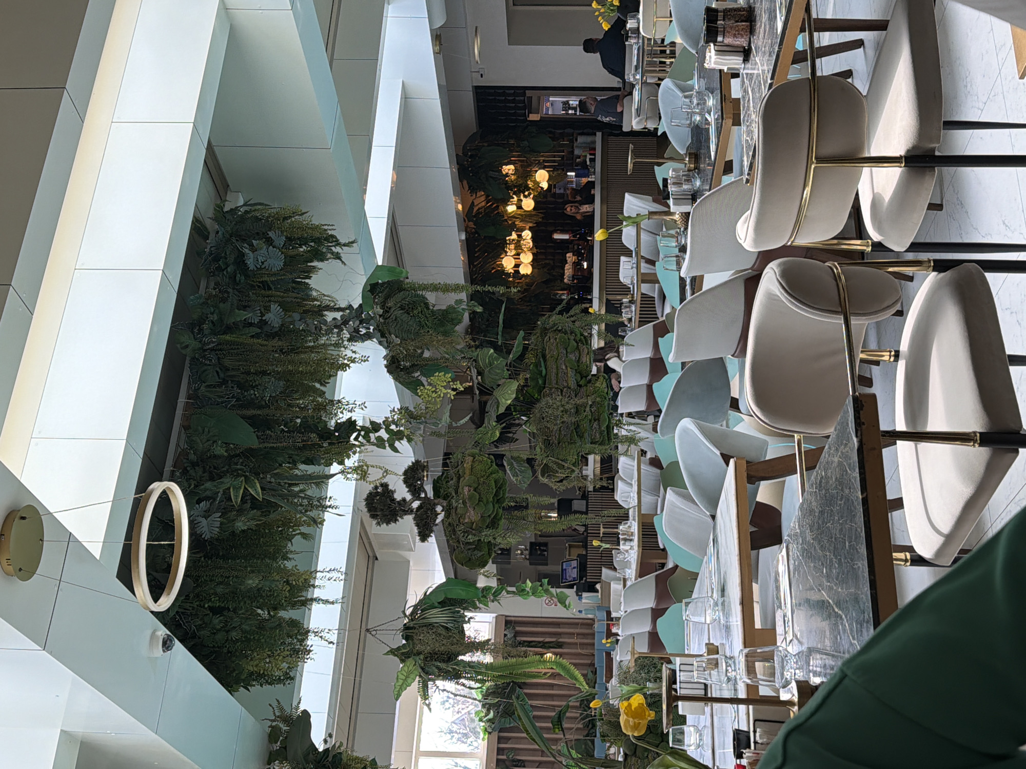 Woman visits modern restaurant in Constanța, Romania