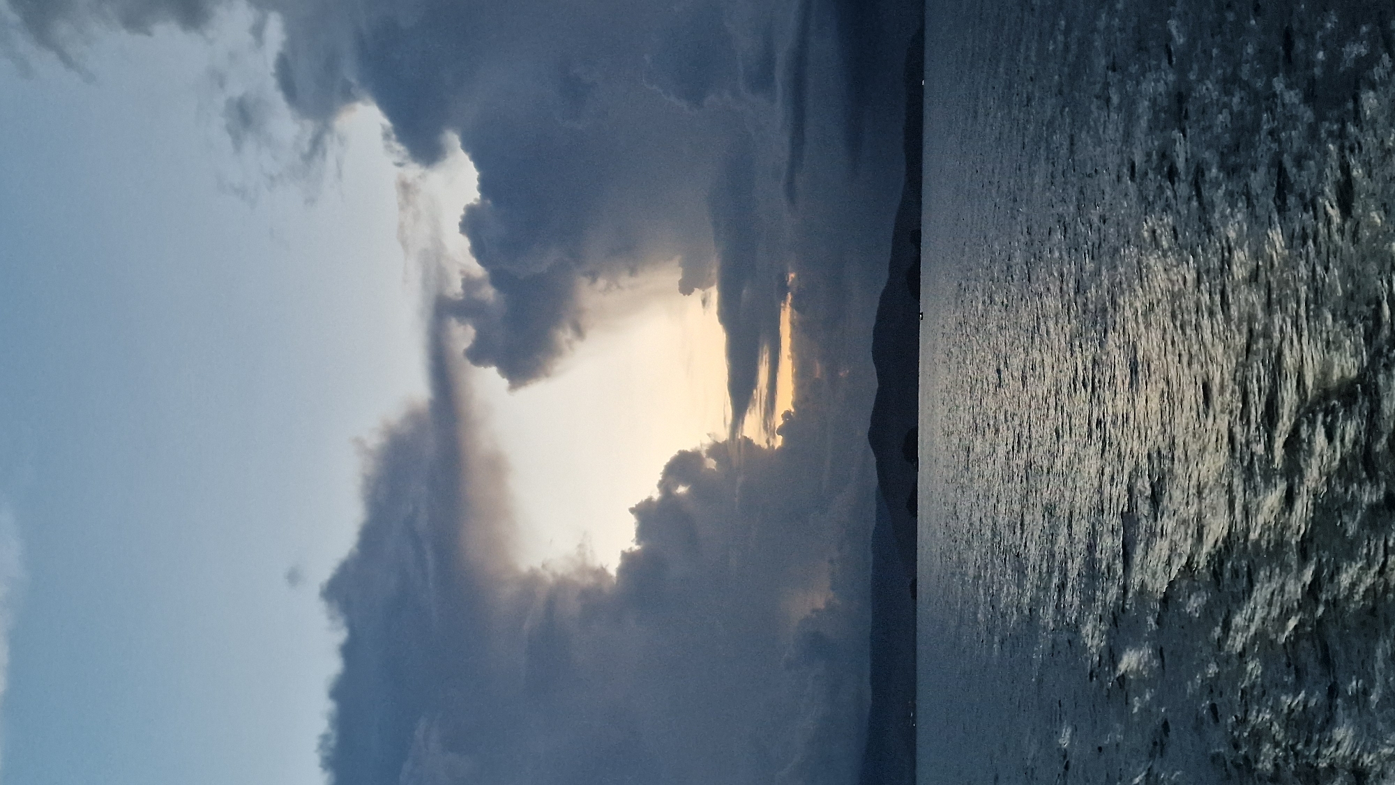 Dramatic sky with breaking light observed over Thai waters