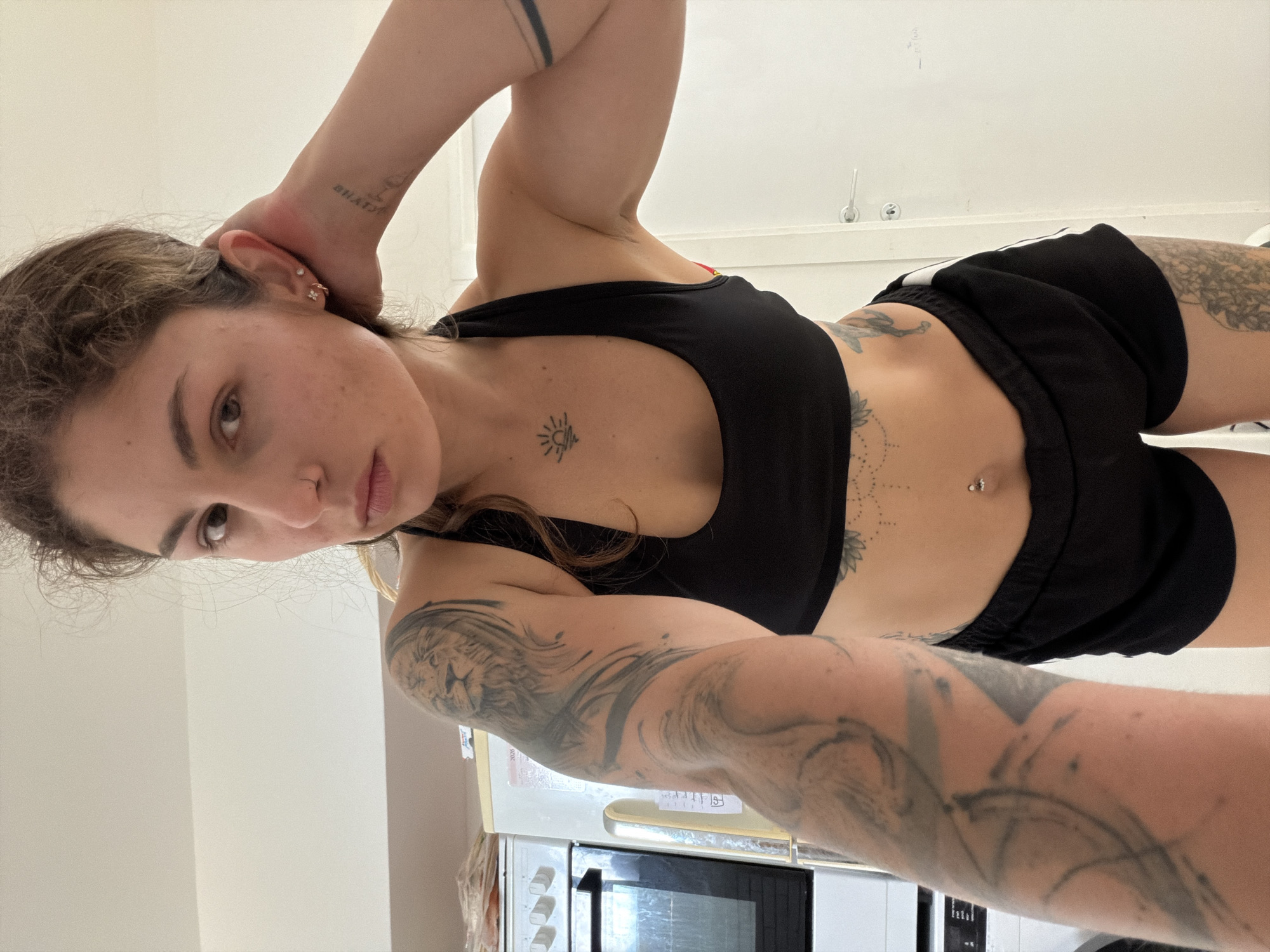 Woman photographed in athletic wear indoors in Kiryat Bialik