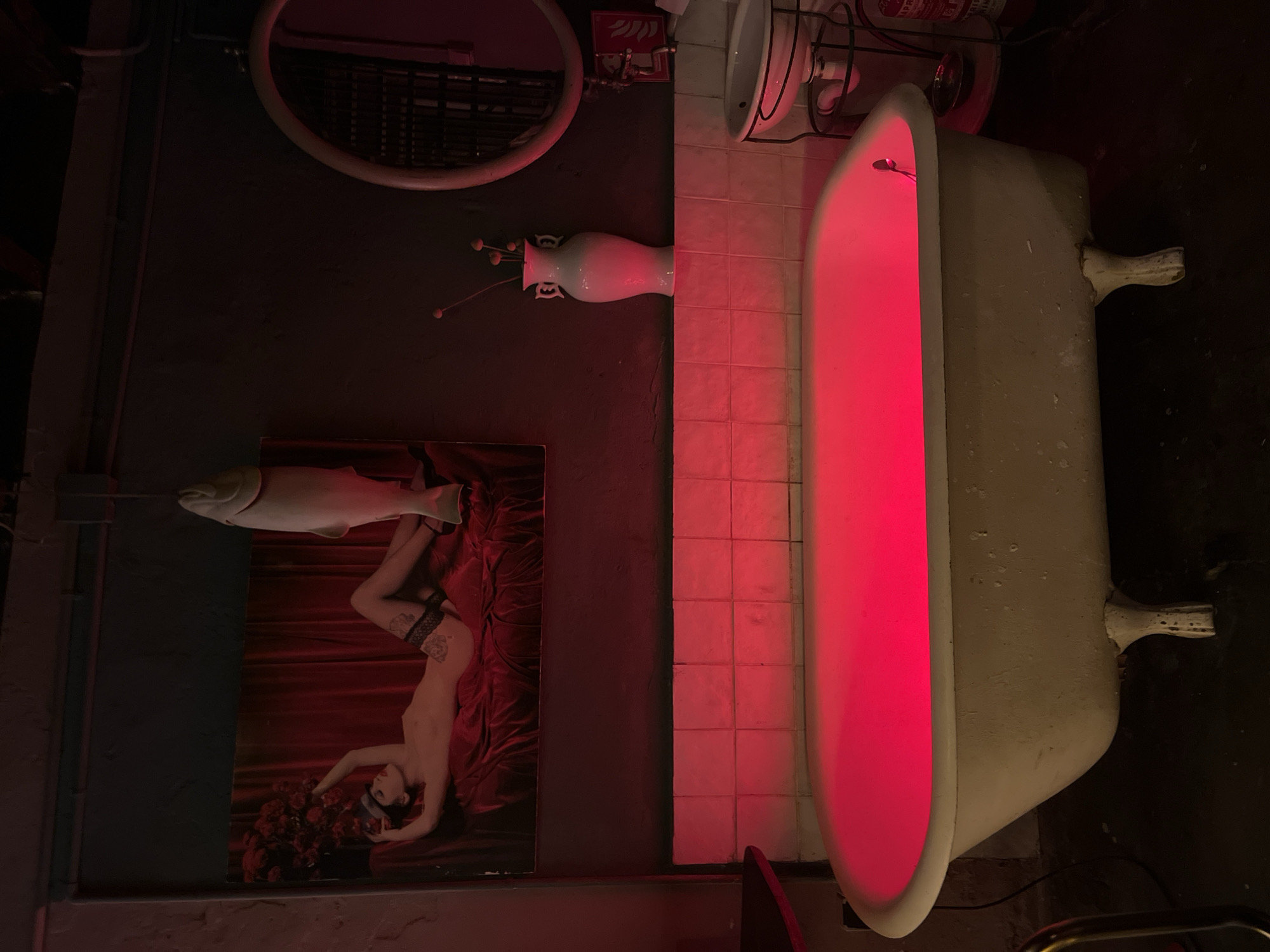 Evening documentation of artistic Barcelona bar interior and surroundings